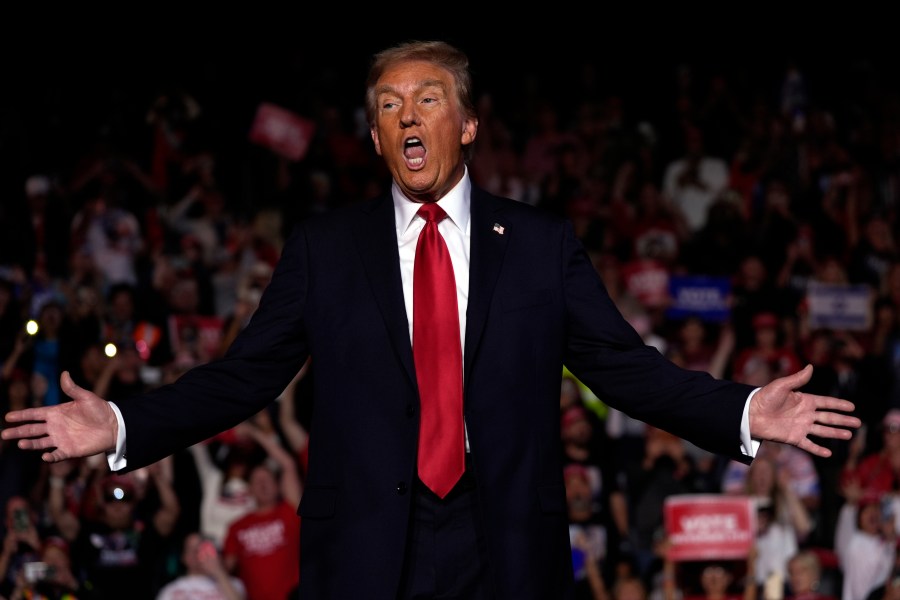 Republican presidential nominee former President Donald Trump gestures during a campaign rally at Lee's Family Forum, Thursday, Oct. 31, 2024, in Henderson, Nev. (AP Photo/Julia Demaree Nikhinson)