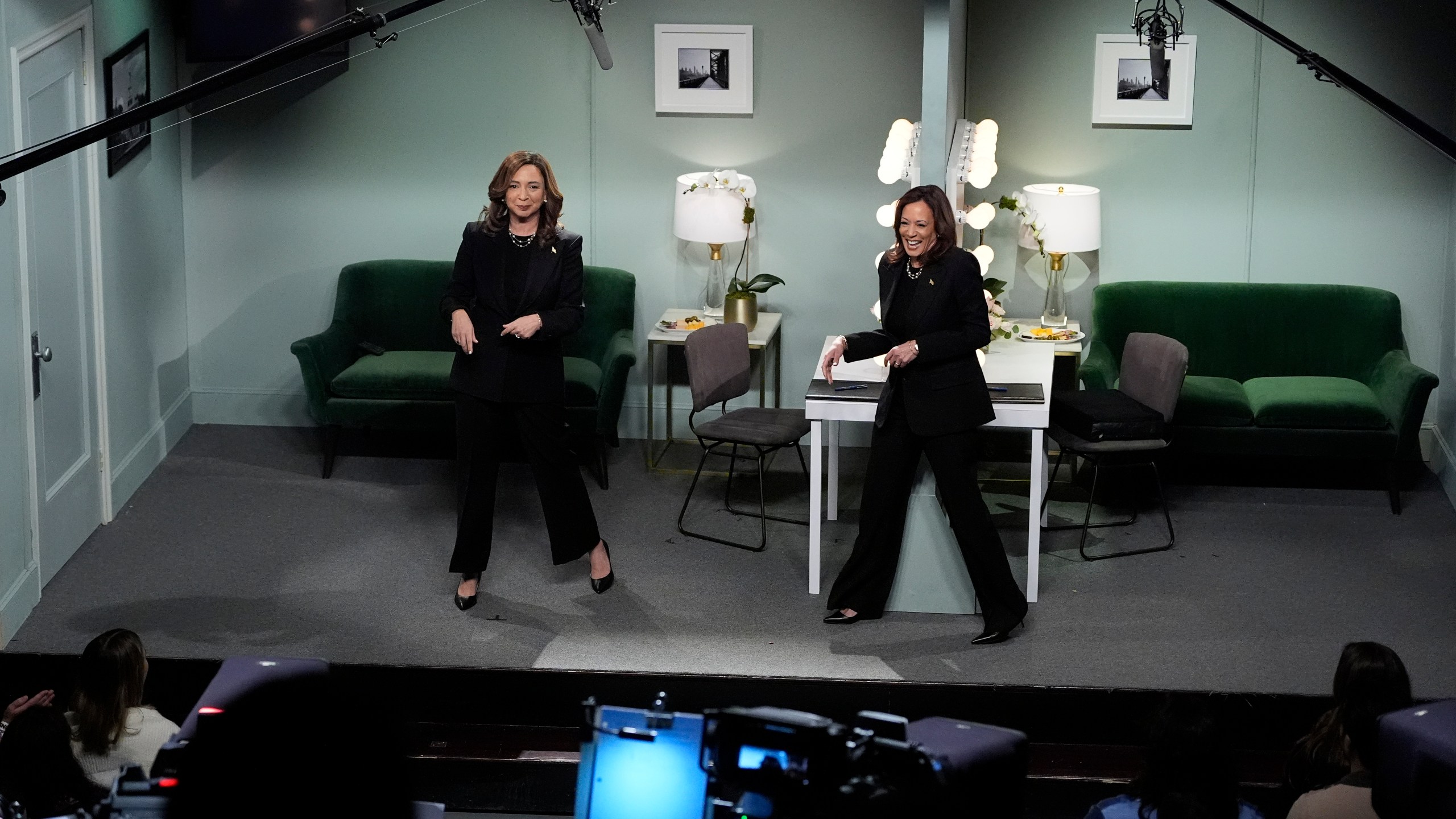 Democratic presidential nominee Vice President Kamala Harris, right, appears on NBC's "Saturday Night Live," with Maya Rudolph, left, Saturday, Nov. 2, 2024 in New York. Harris has made an unannounced trip to New York to appear briefly stepping away from the battleground states she's been campaigning in with just three days to go before the election. (AP Photo/Jacquelyn Martin)