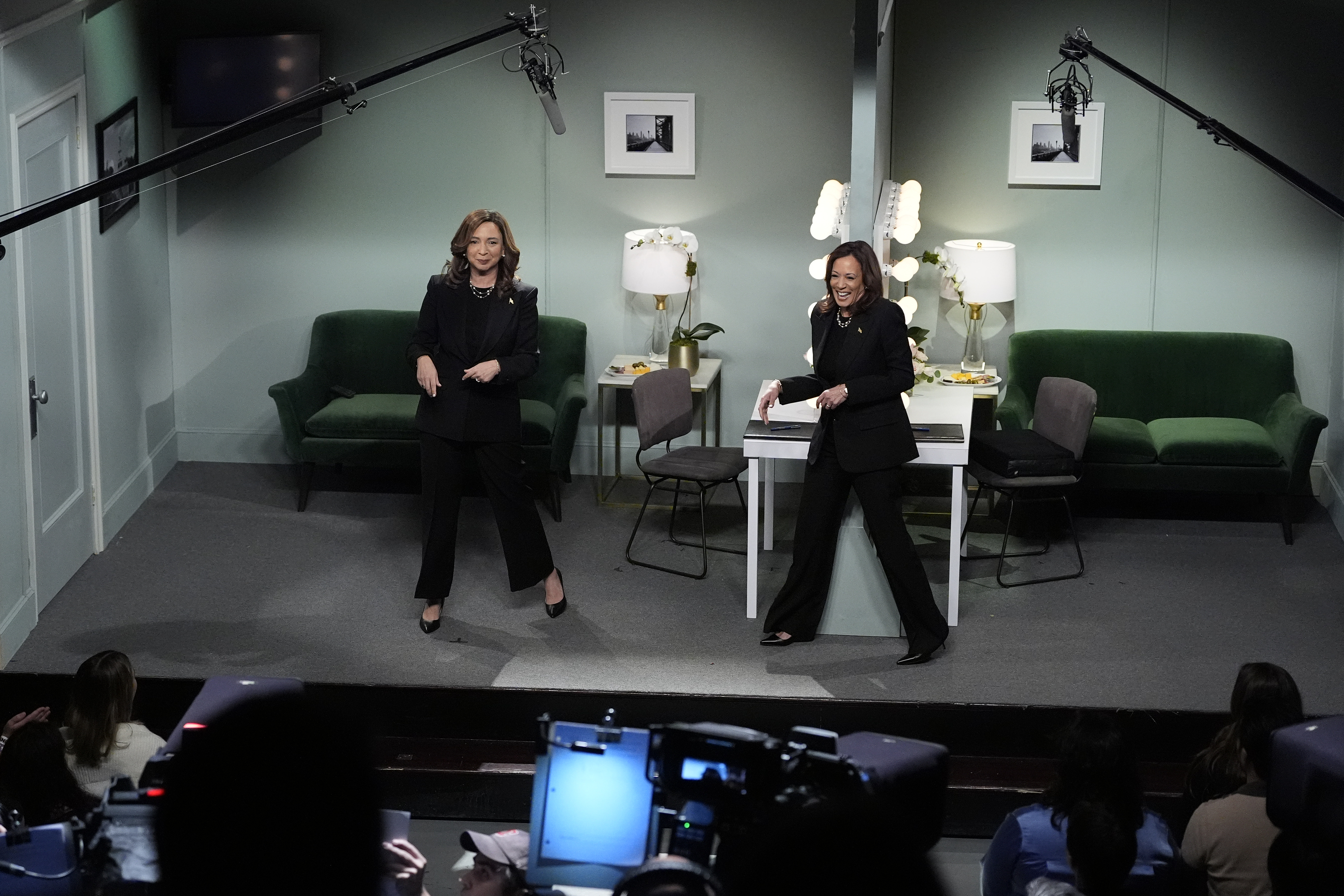 Democratic presidential nominee Vice President Kamala Harris, right, appears on NBC's "Saturday Night Live," with Maya Rudolph, left, Saturday, Nov. 2, 2024 in New York. Harris has made an unannounced trip to New York to appear briefly stepping away from the battleground states she's been campaigning in with just three days to go before the election. (AP Photo/Jacquelyn Martin)