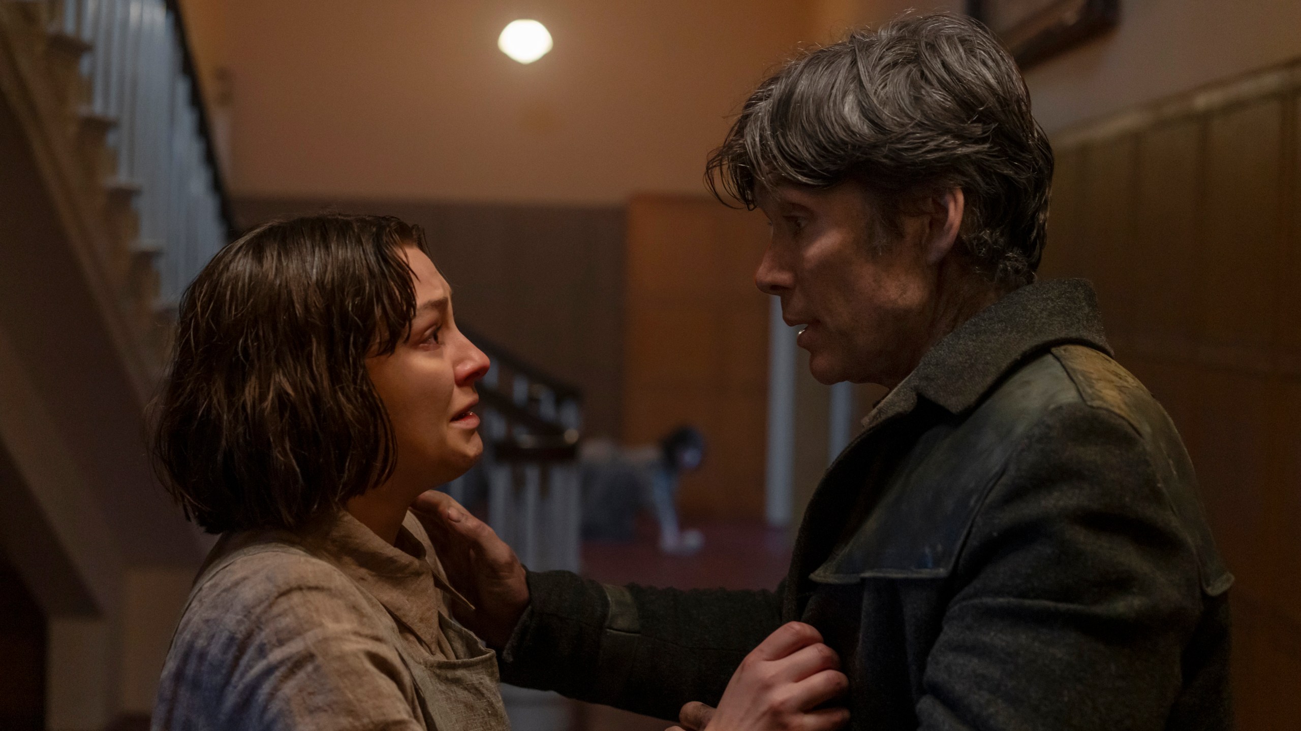 This image released by Lionsgate shows Zara Devin, left, and Cillian Murphy in a scene from "Small Things Like These." (Enda Bowe/Lionsgate via AP)