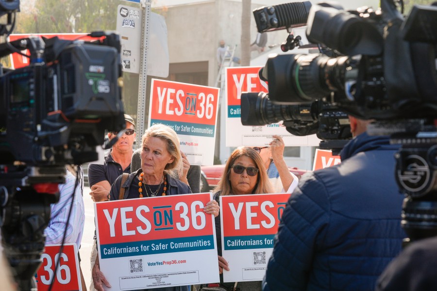 FILE - Neighbors and local business owners join in to support California's Proposition 36 on the November ballot at a news conference in the Venice neighborhood of Los Angeles on Monday, Sept. 30, 2024. (AP Photo/Damian Dovarganes, File)