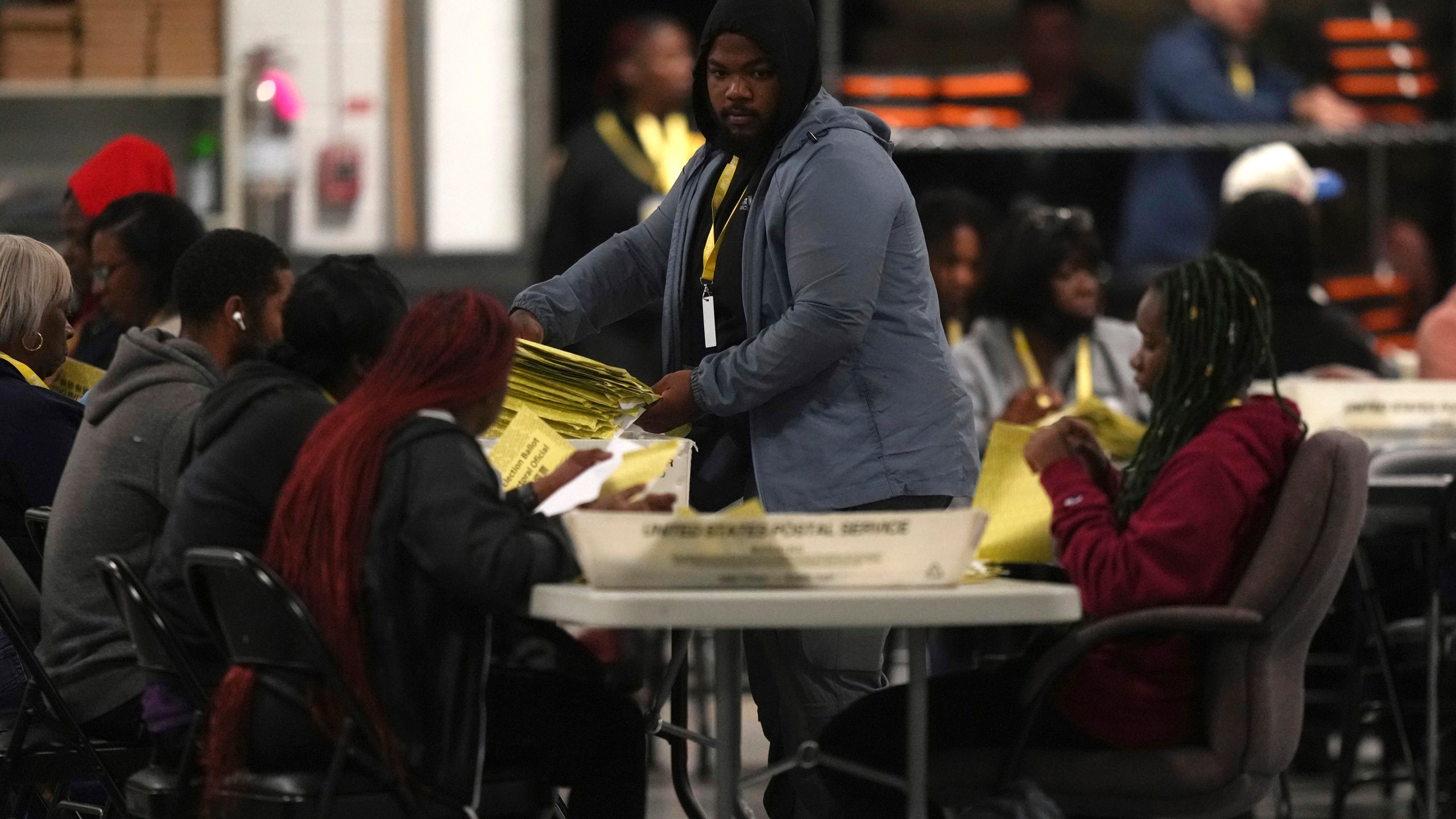 Election workers process mail-in ballots for the 2024 General Election in the United States at the Philadelphia Election Warehouse, early Monday, Nov. 6, 2024, in Philadelphia. (AP Photo/Matt Slocum)