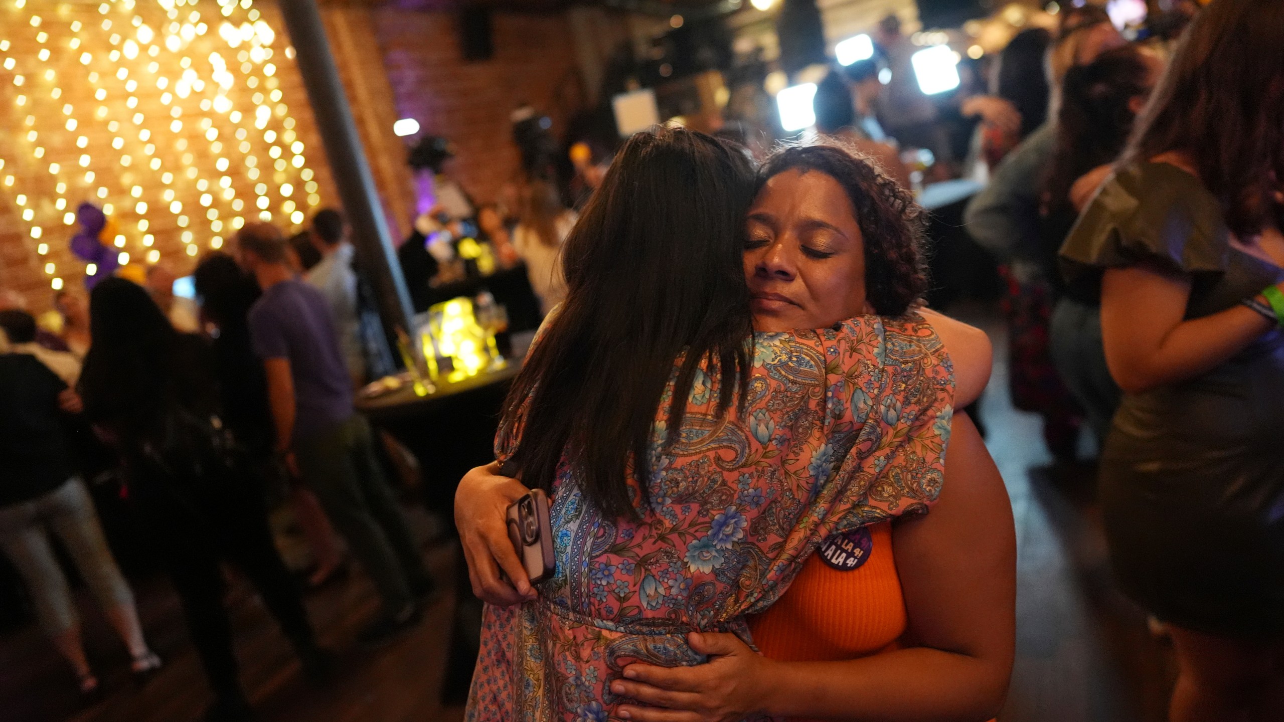 Supporters of Florida's Amendment 4, which would have enshrined abortion rights in the state, react after the amendment's defeat, during a watch party for the Yes On 4 campaign, on Election Day, Tuesday, Nov. 5, 2024, in St. Petersburg, Fla. (AP Photo/Rebecca Blackwell)