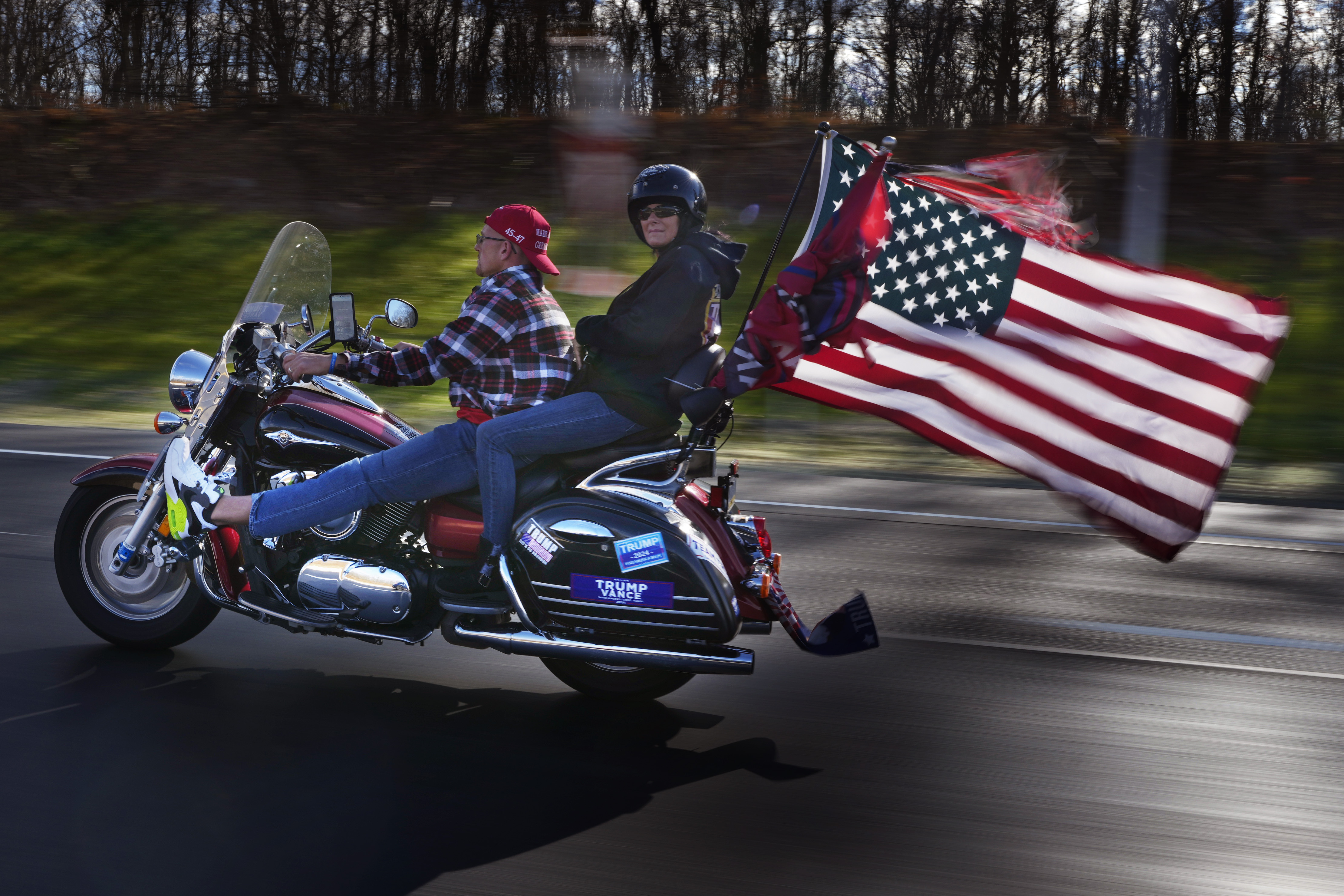 Bikers show their support for President-elect Donald Trump while riding on I-84, Wednesday, Nov. 6, 2024, near Lords Valley, Pa. (AP Photo/Robert F. Bukaty)