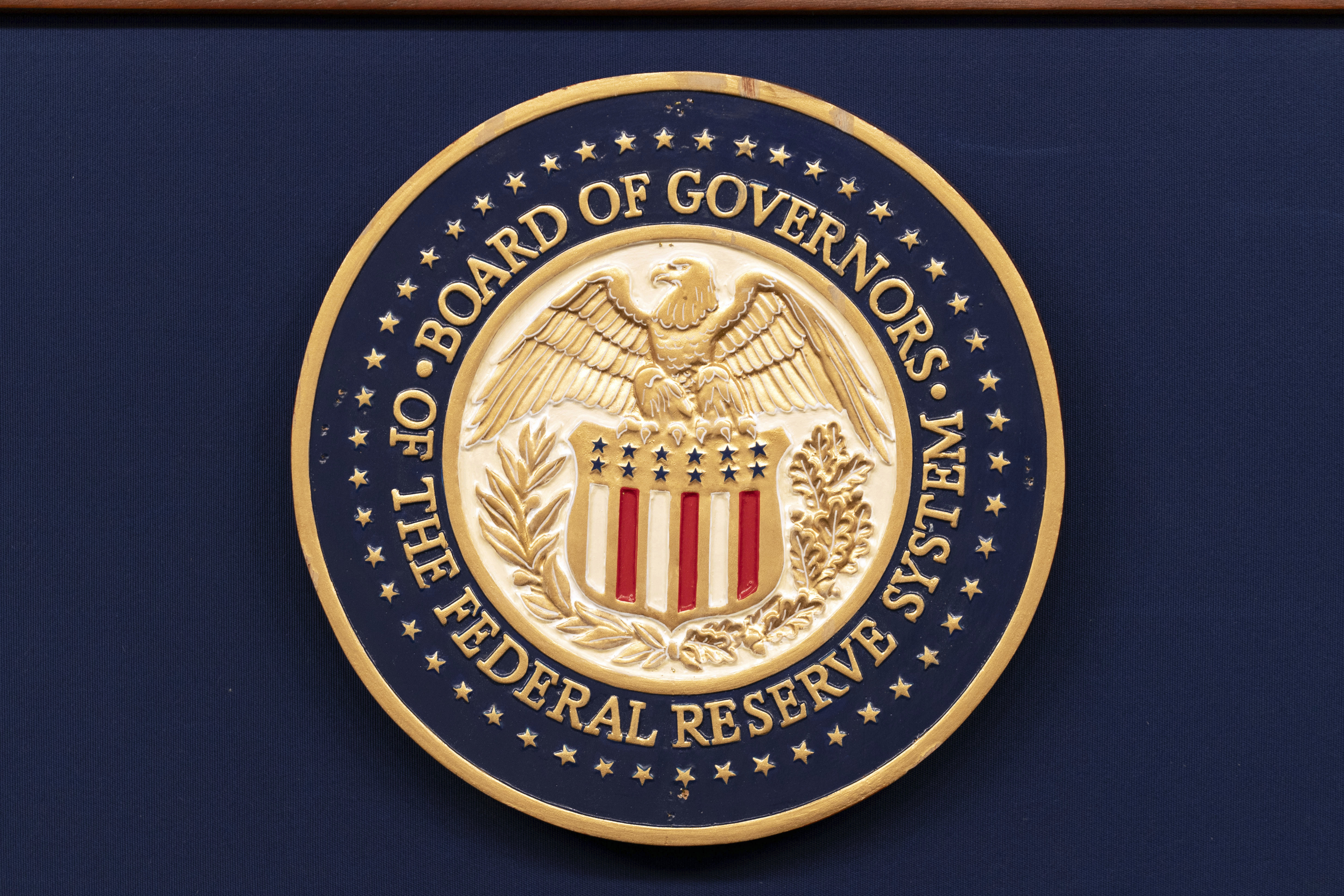 FILE - The seal of The Federal Reserve System is seen during a news conference by Federal Reserve Board Chairman Jerome Powell at the Federal Reserve Board Building on July 31, 2024, in Washington. (AP Photo/Jose Luis Magana, File)