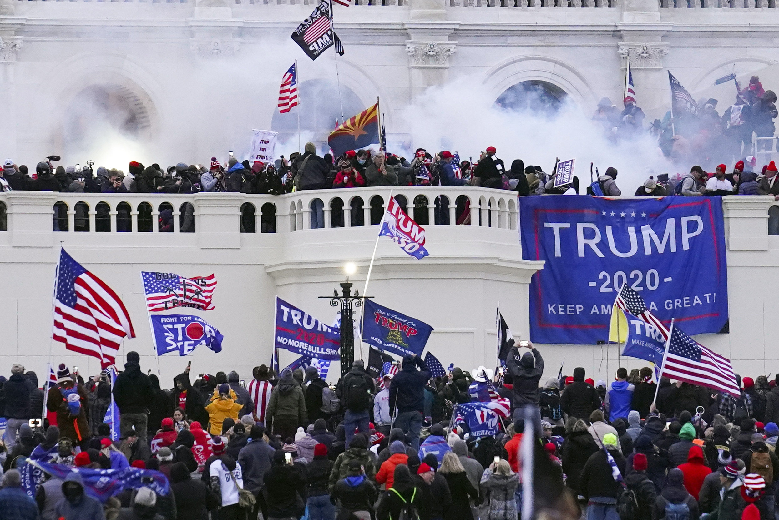 FILE - Rioters storm the West Front of the U.S. Capitol Jan. 6, 2021, in Washington. (AP Photo/John Minchillo, File)