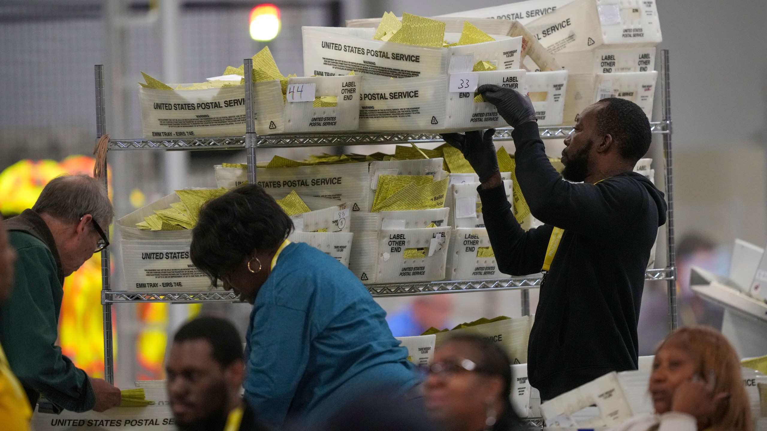 Election workers process mail-in ballots for the 2024 General Election at the Philadelphia Election Warehouse, Tuesday, Nov. 5, 2024, in Philadelphia. (AP Photo/Matt Rourke)