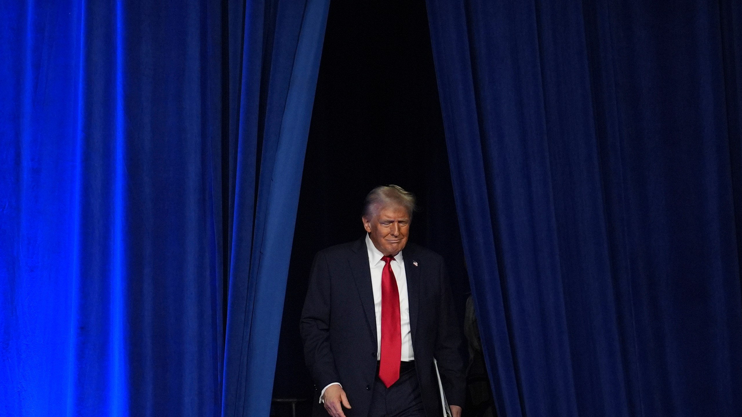 FILE - Republican presidential nominee former President Donald Trump arrives at an election night watch party at the Palm Beach Convention Center, Nov. 6, 2024, in West Palm Beach, Fla. (AP Photo/Evan Vucci, File)