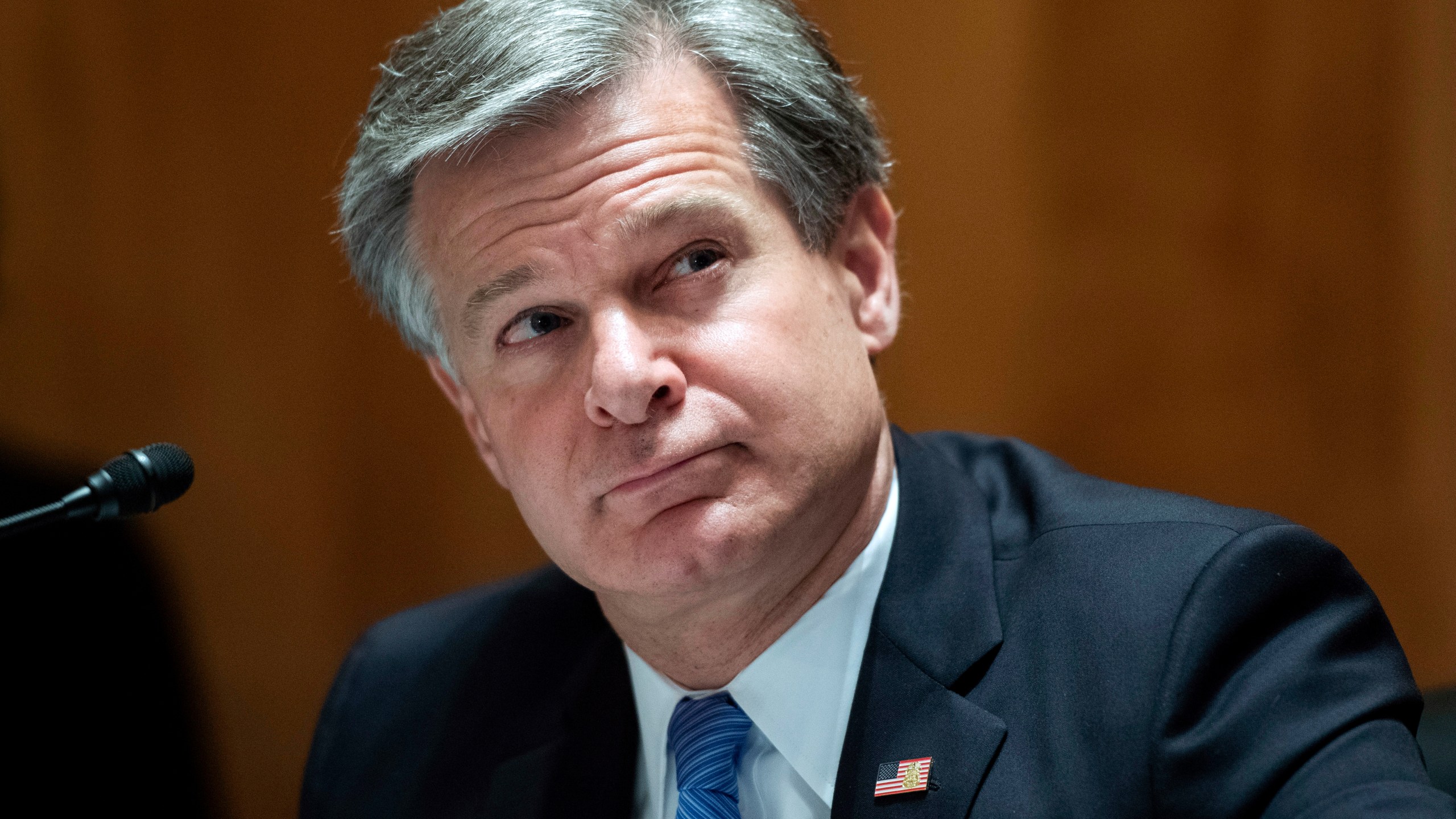 FILE - FBI Director Christopher Wray testifies on Capitol Hill in Washington, Sept. 24, 2020. (Tom Williams/Pool via AP, File)