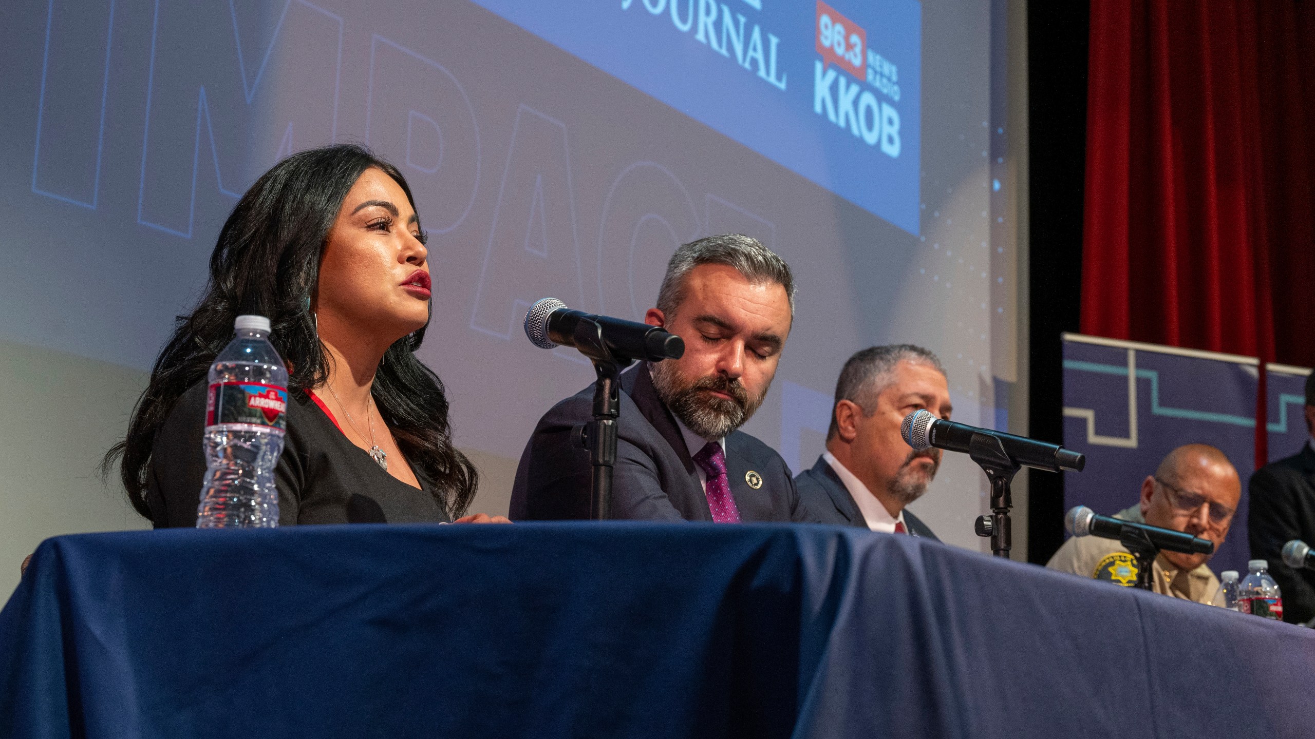 The Albuquerque Journal, KOAT and KKOB sponsored a town hall meeting on crime at the African American Performing Arts Center in Albuquerque, N.M., Wednesday, April 17, 2024. On the panel are, from left, Nicole Chavez, who lost her son in 2015 to violent crime and is now a candidate for the New Mexico House of Representatives, Attorney General Raul Torrez, Bernalillo County District Attorney Sam Bregman and Bernalillo County Sheriff John Allen. (Eddie Moore /The Albuquerque Journal via AP)