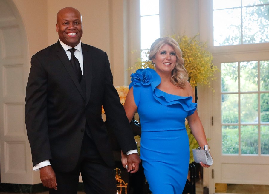 FILE - Craig Robinson, brother of former first lady Michelle Obama, and his wife, Kelly Robinson, arrive for a State Dinner for Singapore's Prime Minister Lee Hsien Loong, Aug. 2, 2016, at the White House in Washington. (AP Photo/Pablo Martinez Monsivais, File)