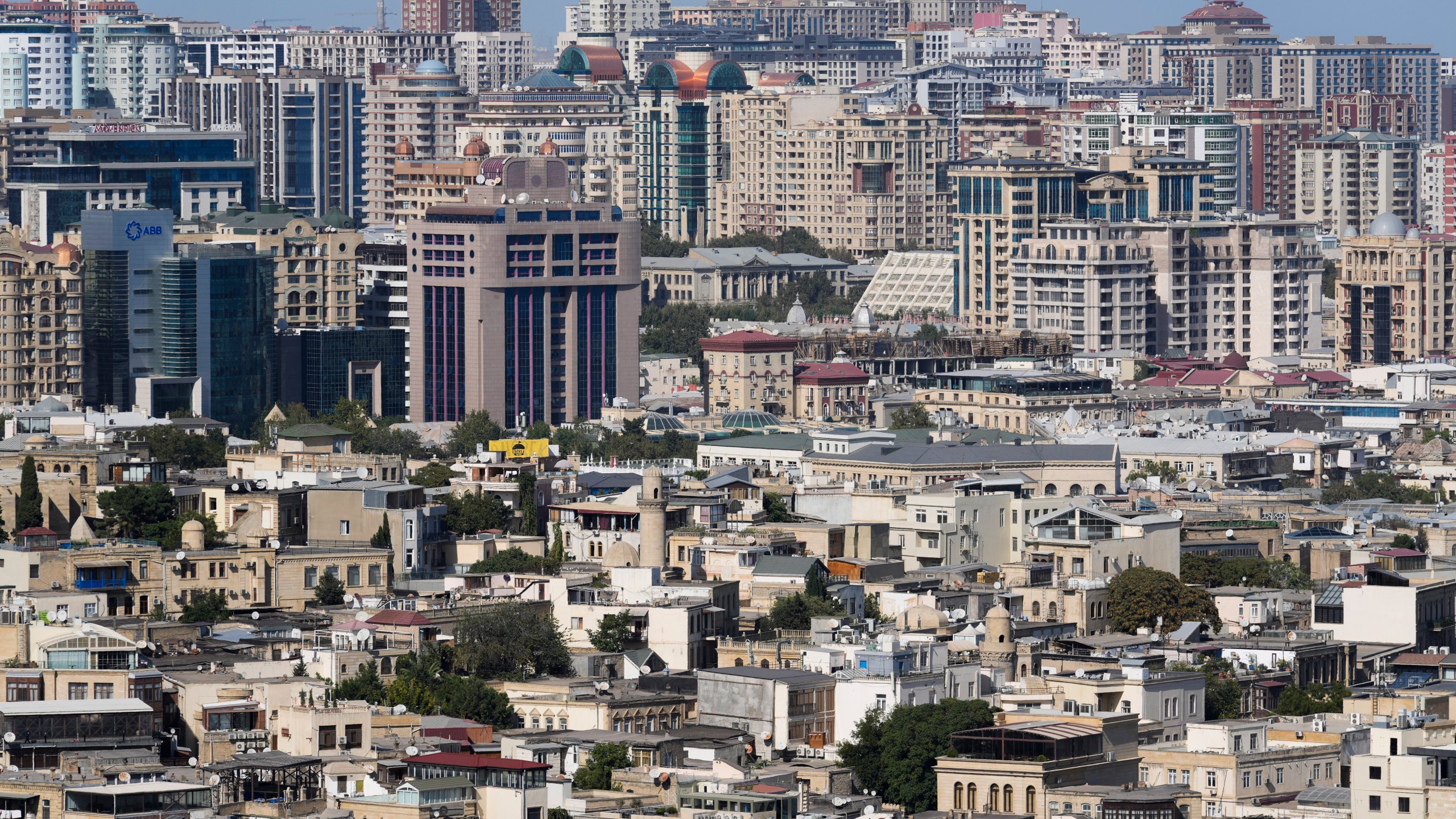 Buildings are visible in Baku, Azerbaijan, Monday, Sept. 16, 2024. (AP Photo/Sergei Grits)