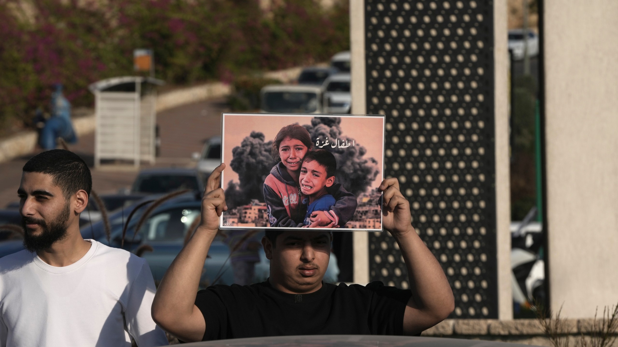 Palestinian citizens of Israel protest against Israel's military operations in the Gaza Strip and Lebanon, in Umm Al-Fahm, Israel, Saturday, Nov. 9, 2024. (AP Photo/Mahmoud Illean)