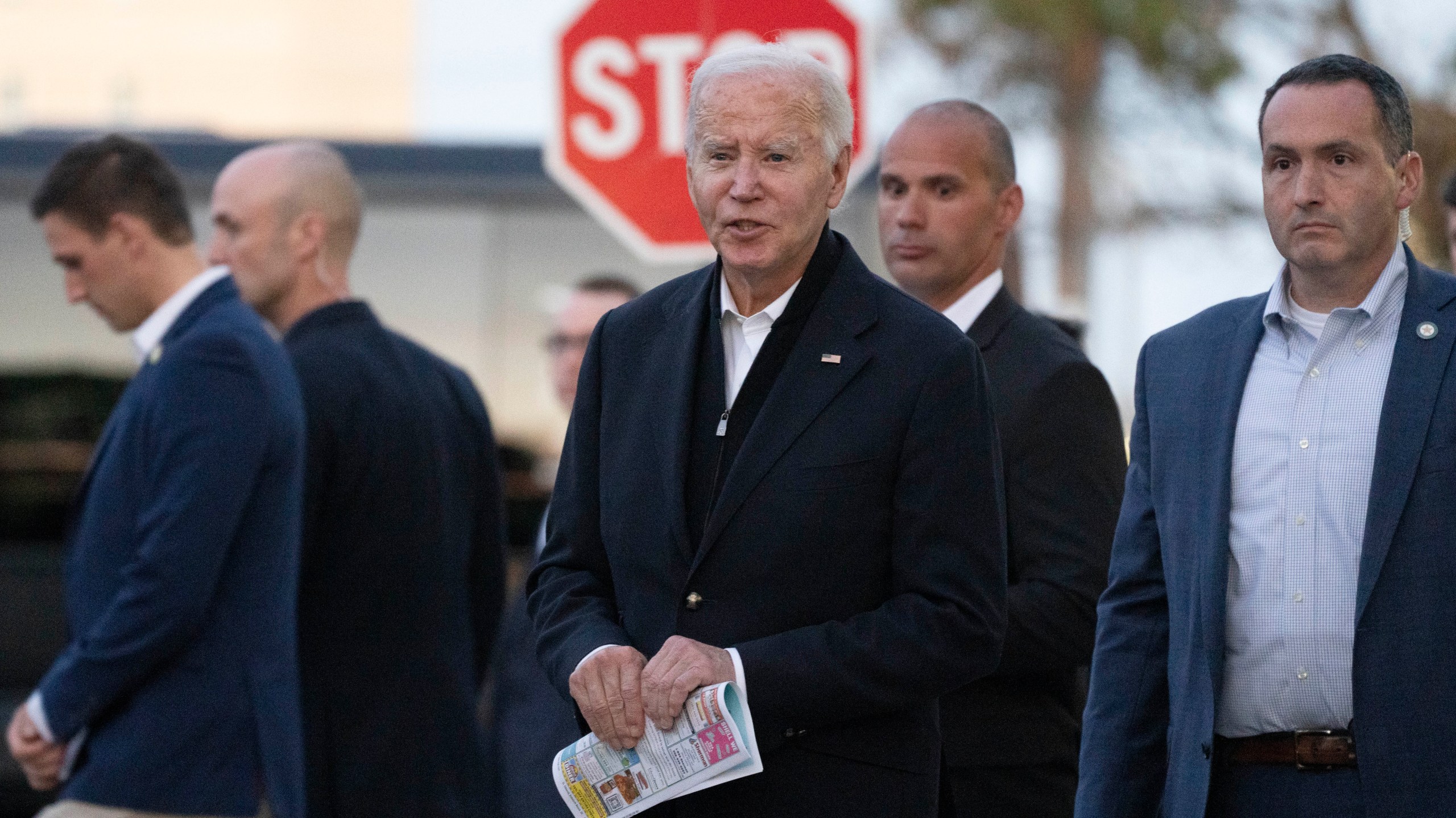 President Joe Biden responds to reporters' questions as he leaves St. Edmond Roman Catholic Church in Rehoboth Beach, Del., after attending mass, Saturday, Nov. 9, 2024. (AP Photo/Manuel Balce Ceneta)