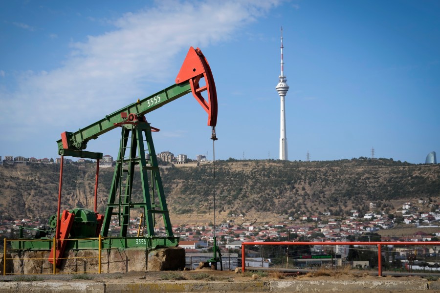 A pumpjack operates at a drilling site in Baku, Azerbaijan, Monday, Sept. 16, 2024. (AP Photo/Sergei Grits)