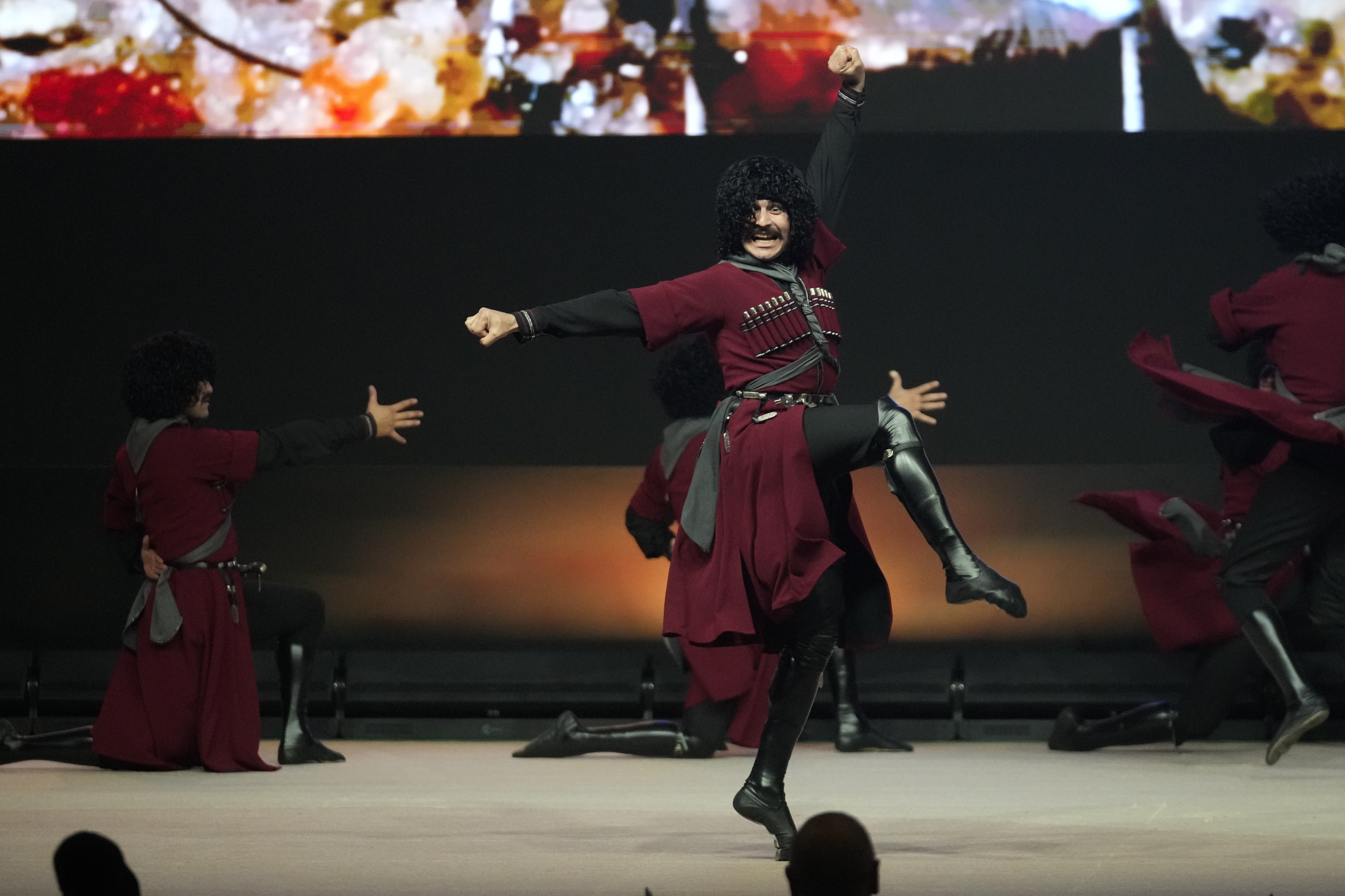 Dancers perform at the COP29 U.N. Climate Summit, Tuesday, Nov. 12, 2024, in Baku, Azerbaijan. (AP Photo/Rafiq Maqbool)