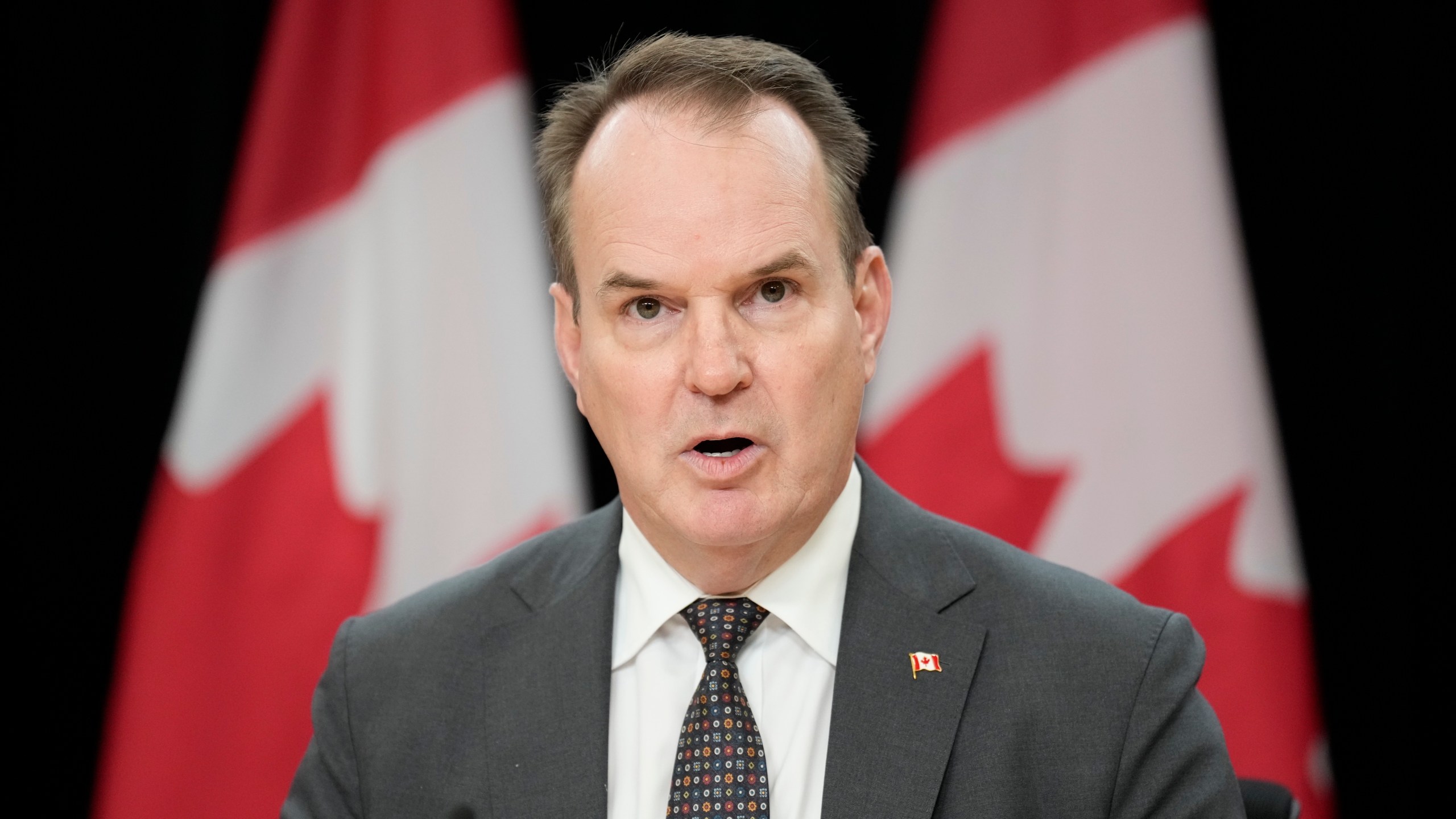 Canada Labour Minister Steven MacKinnon speaks with media during a news conference, Tuesday, Nov. 12, 2024, in Ottawa. (Adrian Wyld/The Canadian Press via AP)