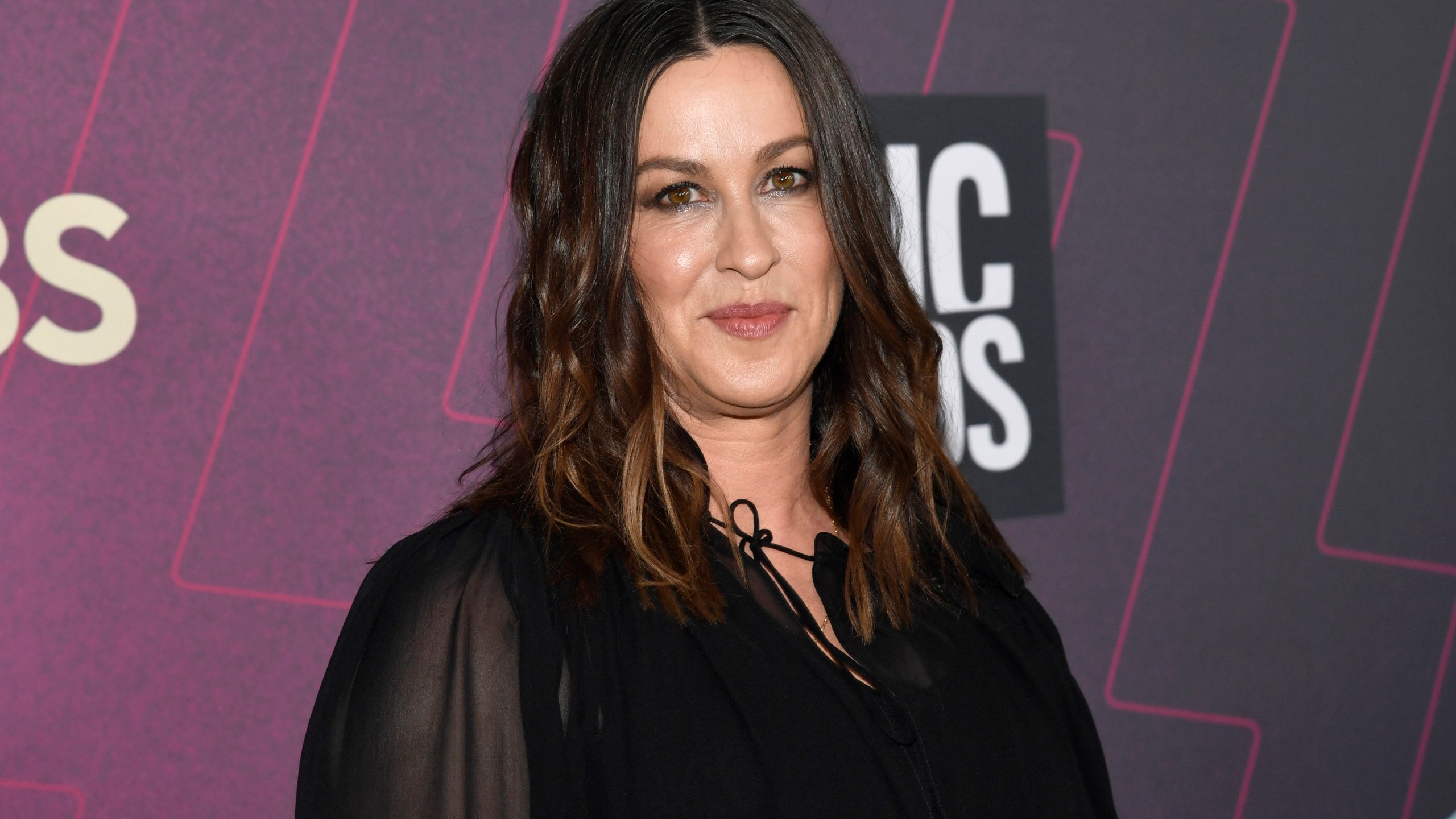 FILE - Alanis Morissette arrives at the CMT Music Awards in Austin, Texas on April 2, 2023. (Photo by Evan Agostini/Invision/AP, File)