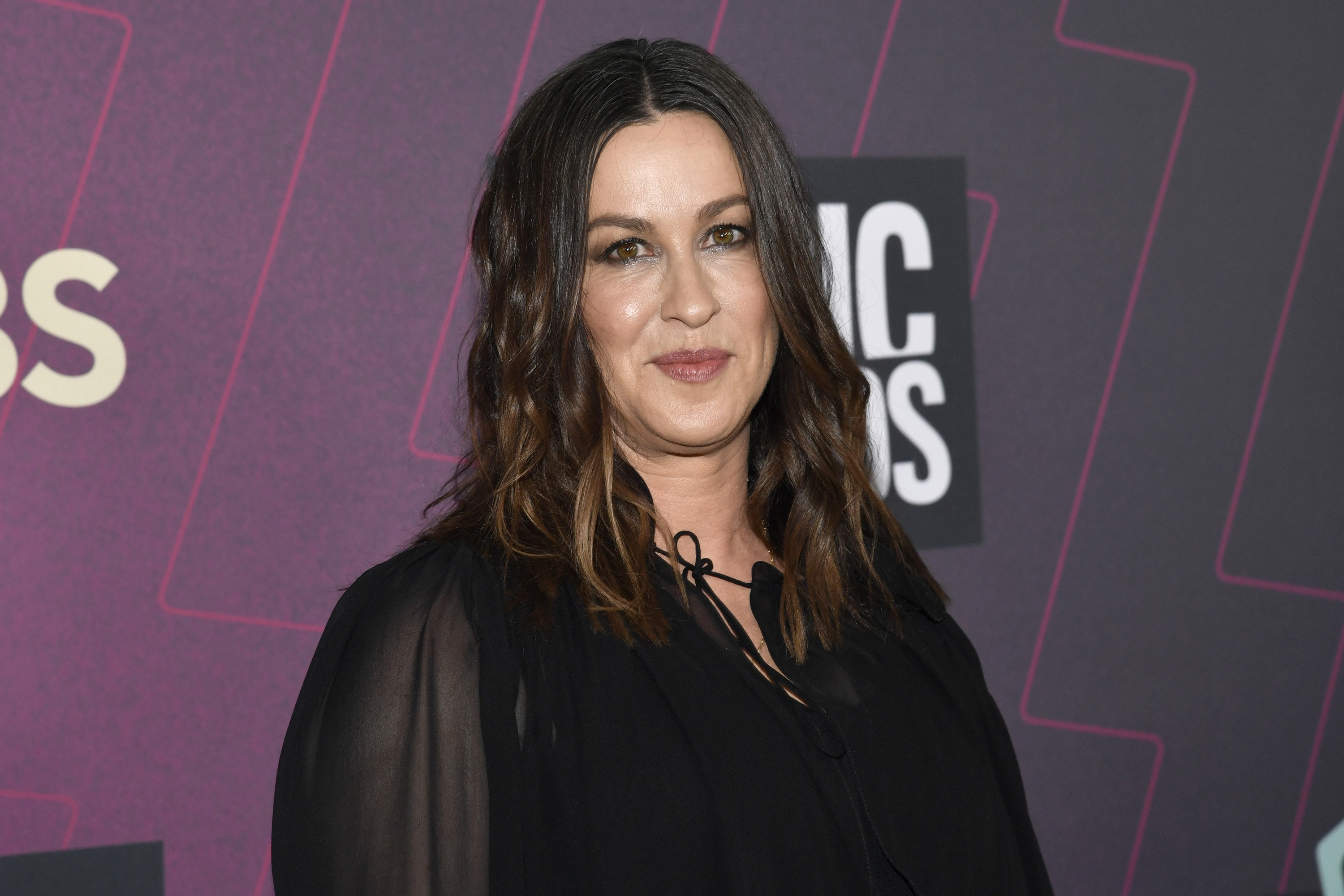 FILE - Alanis Morissette arrives at the CMT Music Awards in Austin, Texas on April 2, 2023. (Photo by Evan Agostini/Invision/AP, File)