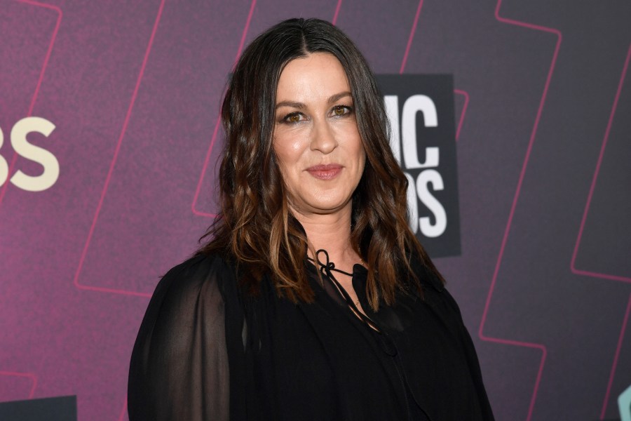 FILE - Alanis Morissette arrives at the CMT Music Awards in Austin, Texas on April 2, 2023. (Photo by Evan Agostini/Invision/AP, File)