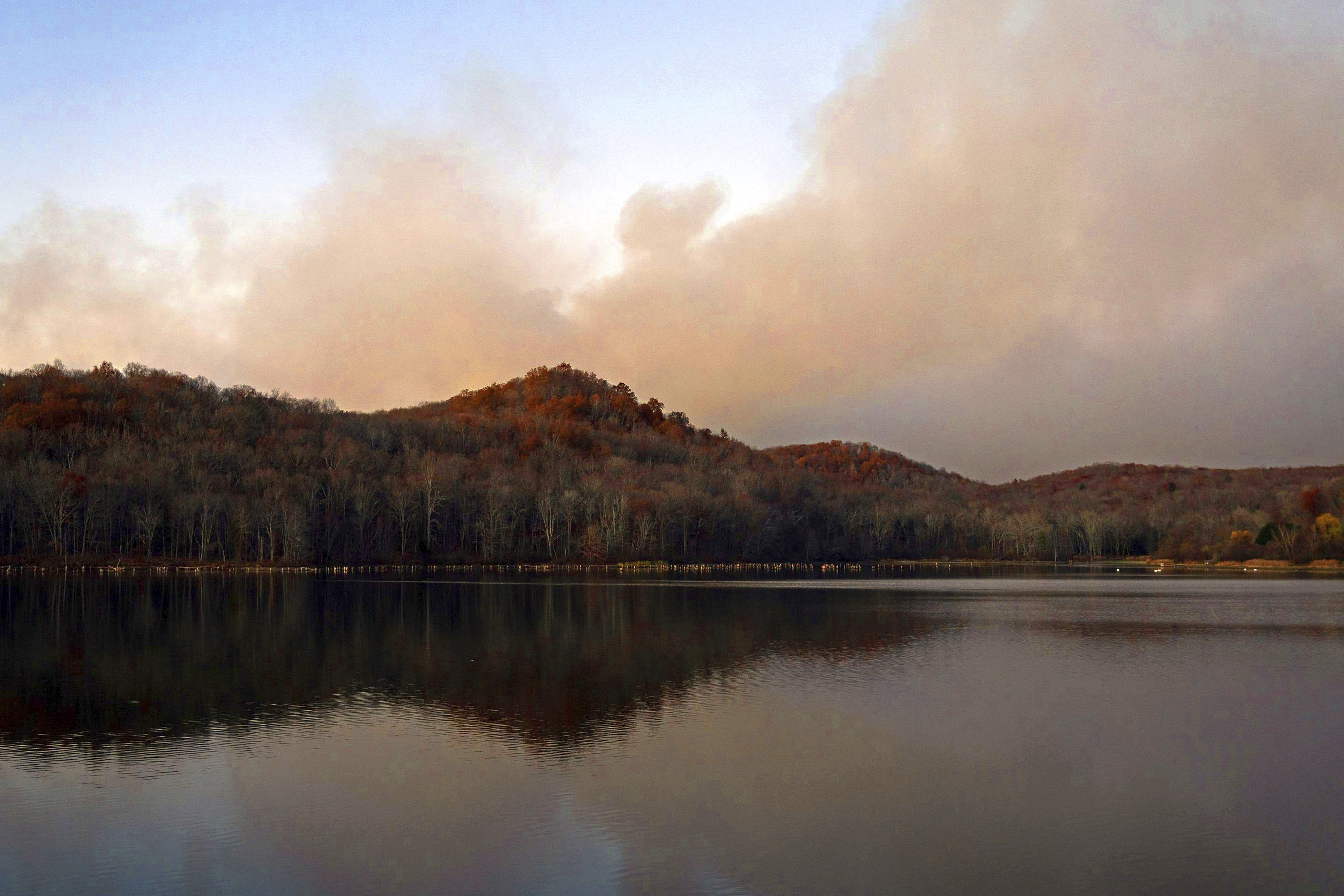 This image provided by New Jersey Department of Environmental Protection shows the wildfire in Jennings Creek, N.J., Saturday, Nov. 9, 2024. (New Jersey Department of Environmental Protection via AP)