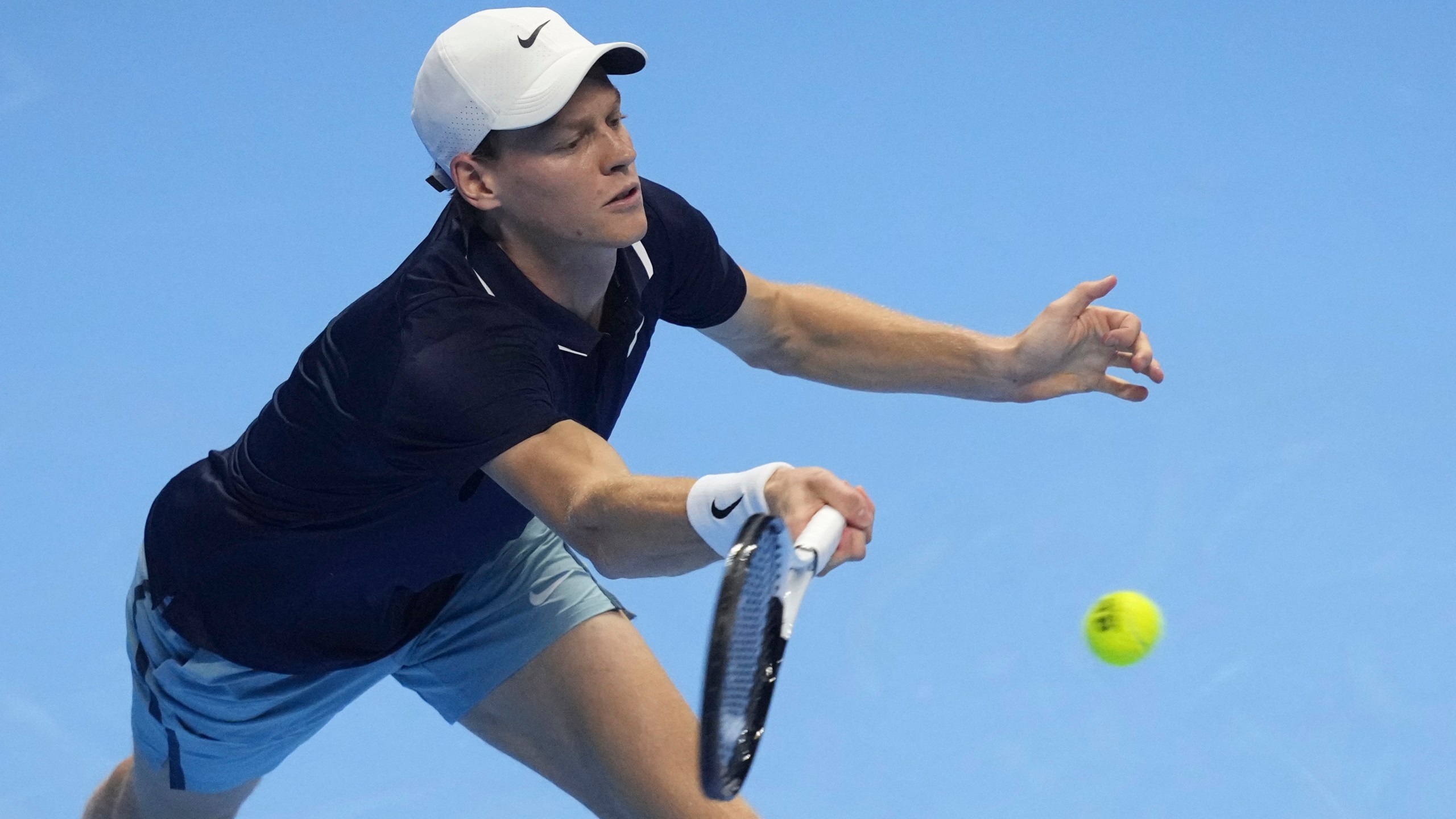 Italy's Jannik Sinner returns the ball to United States' Taylor Fritz during their singles tennis match of the ATP World Tour Finals at the Inalpi Arena, in Turin, Italy, Tuesday, Nov. 12, 2024. (AP Photo/Antonio Calanni)