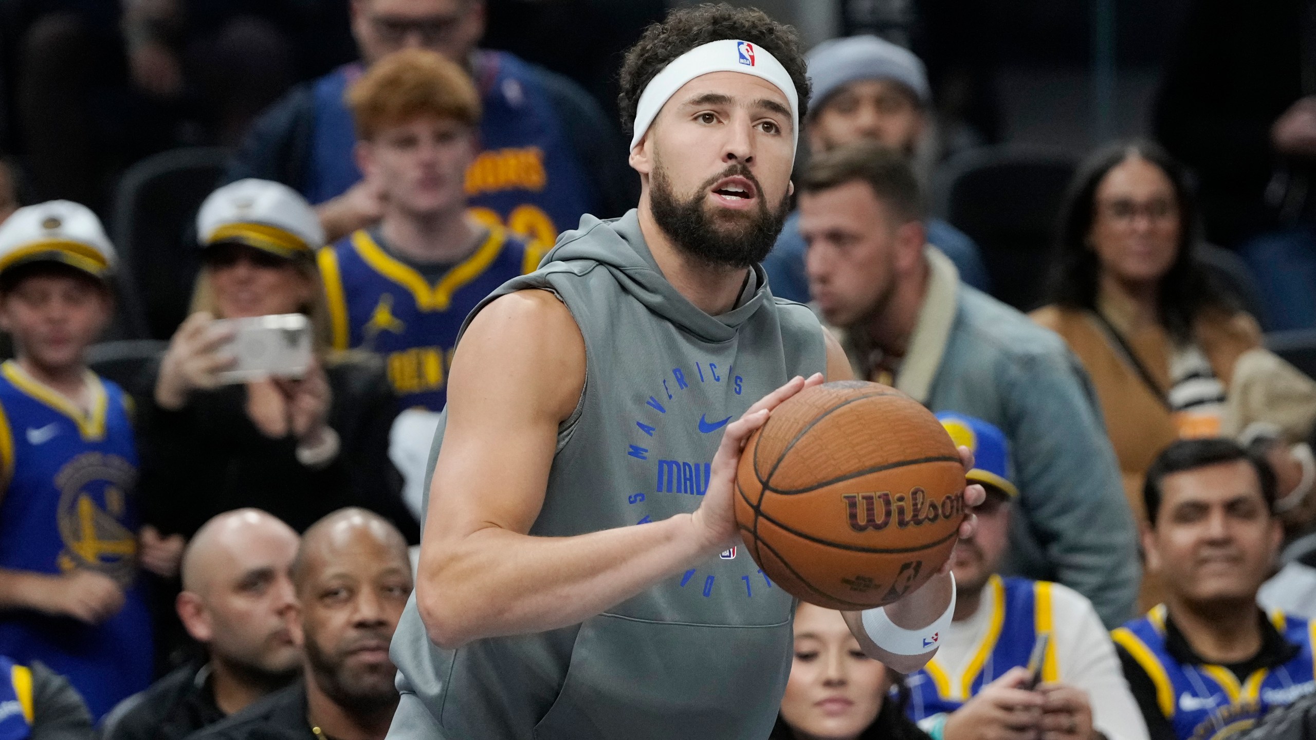 Dallas Mavericks guard Klay Thompson warms up before an Emirates NBA Cup basketball game against the Golden State Warriors in San Francisco, Tuesday, Nov. 12, 2024. (AP Photo/Jeff Chiu)