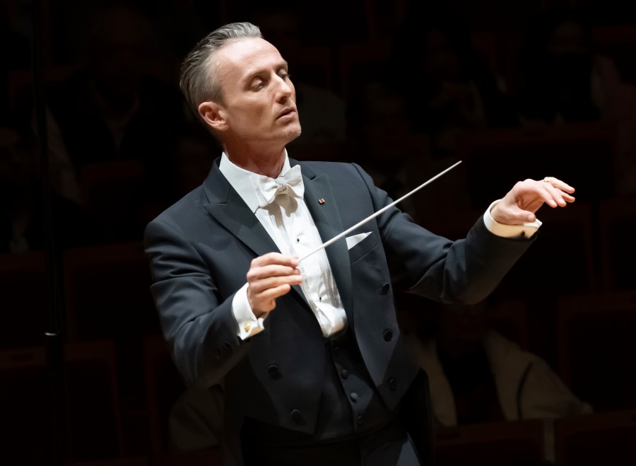 This image released by the Pacific Symphony Orchestra shows guest conductor Alexander Shelley performing the "New World Symphony" concert in the Renee and Henry Segerstrom Concert Hall in Costa Mesa, Calif., on Nov. 30, 2023. Shelley will become music director of the Pacific Symphony Orchestra for the 2026-27 season, following the 3 1/2-decade tenure of Carl St. Clair. (Doug Gifford/Pacific Symphony Orchestra via AP)