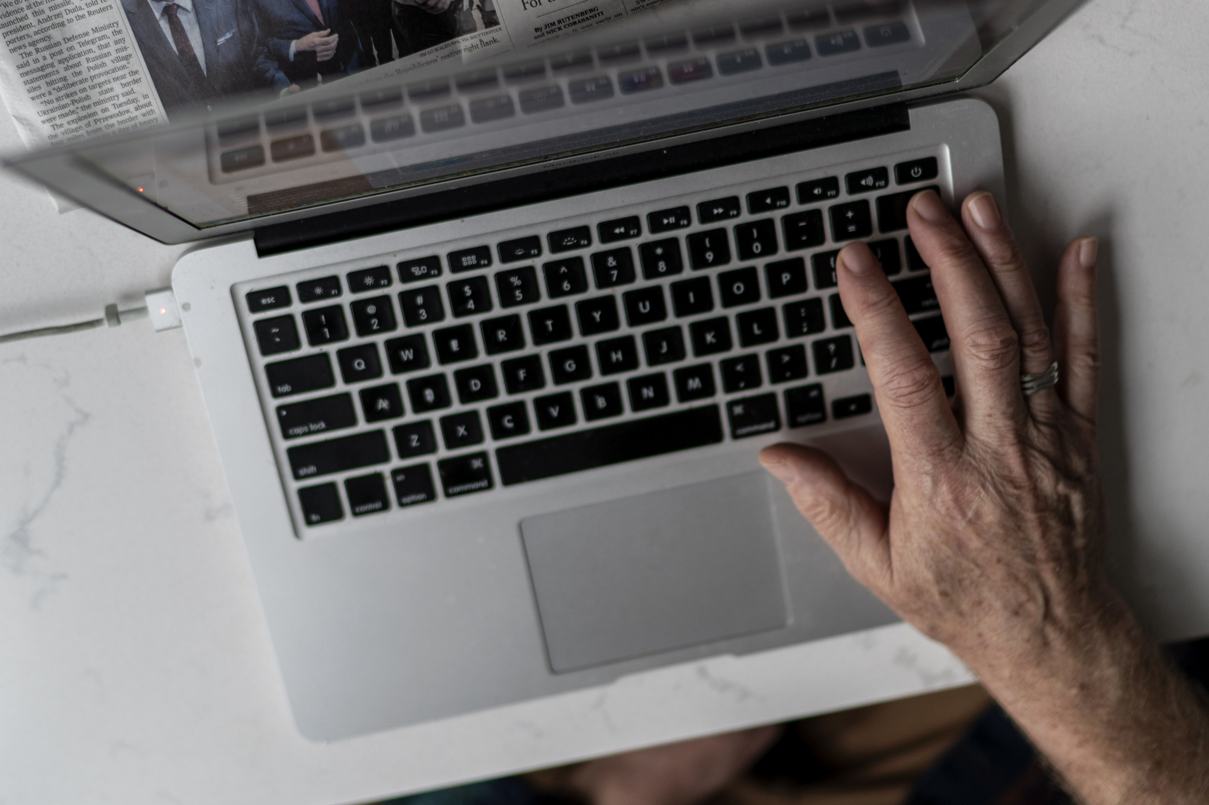 FILE - A person works on a laptop computer in Hudson, Wis., Nov. 16, 2022. (AP Photo/David Goldman, File)