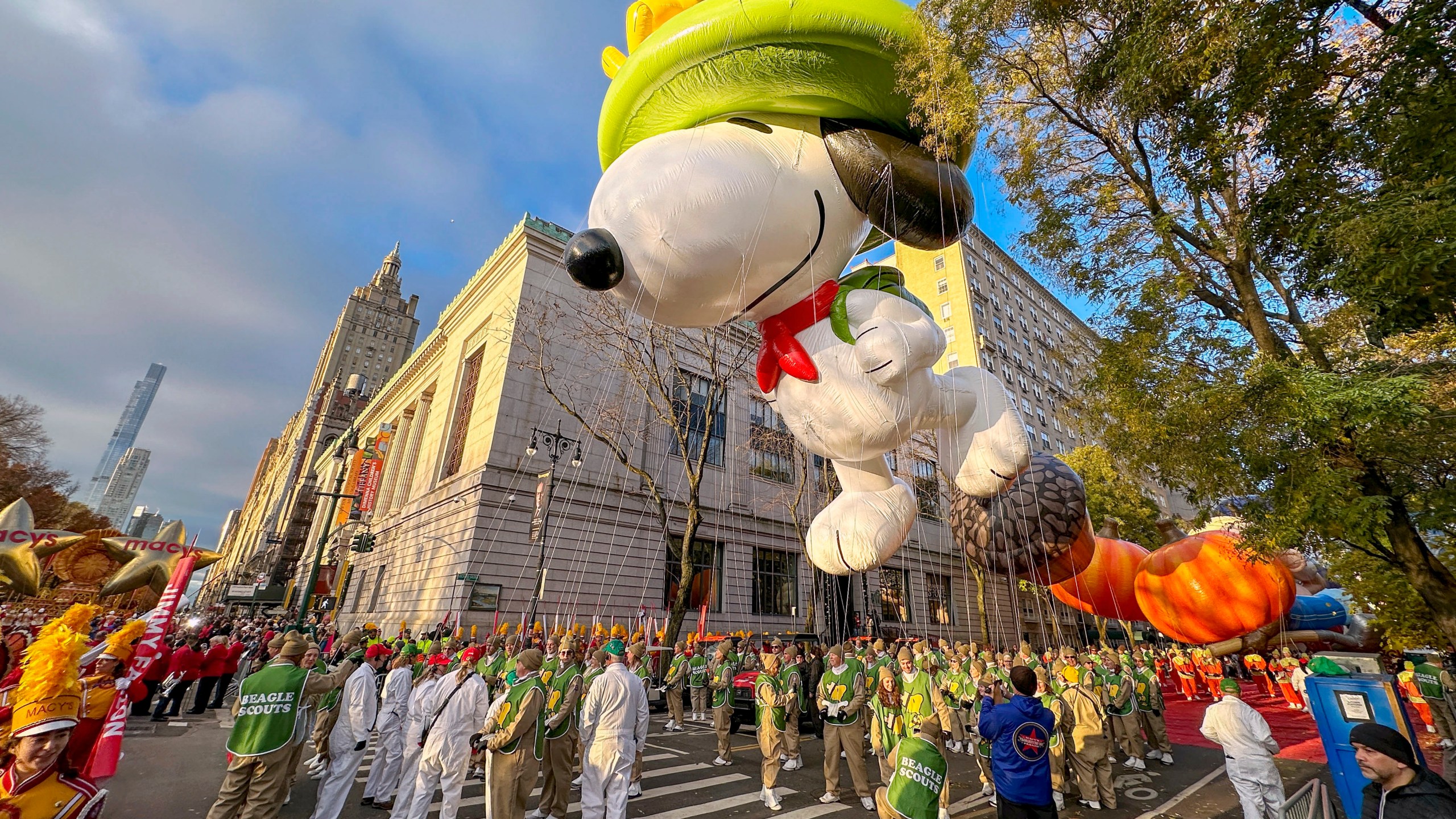 FILE - A Beagle Scout Snoopy balloon floats above Central Park West in New York during the Macy's Thanksgiving Day Parade on Thursday, Nov. 23, 2023. (AP Photo/Ted Shaffrey, File)