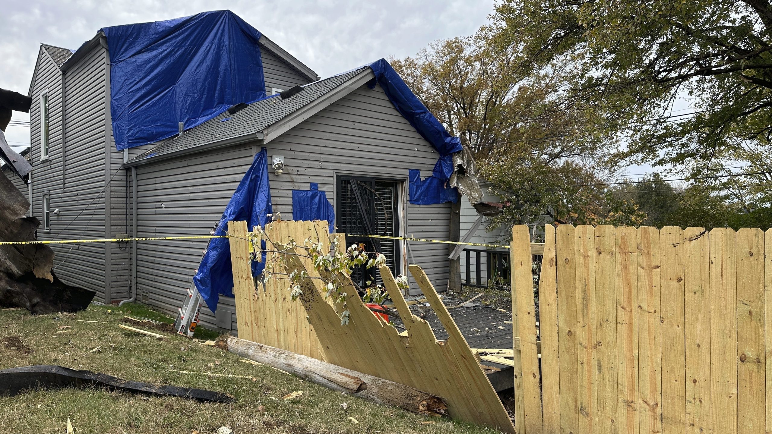 A residential fence near a Louisville, Kentucky, plant that exploded is pictured on Wednesday, Nov. 13, 2024. (AP Photo/Dylan Lovan)