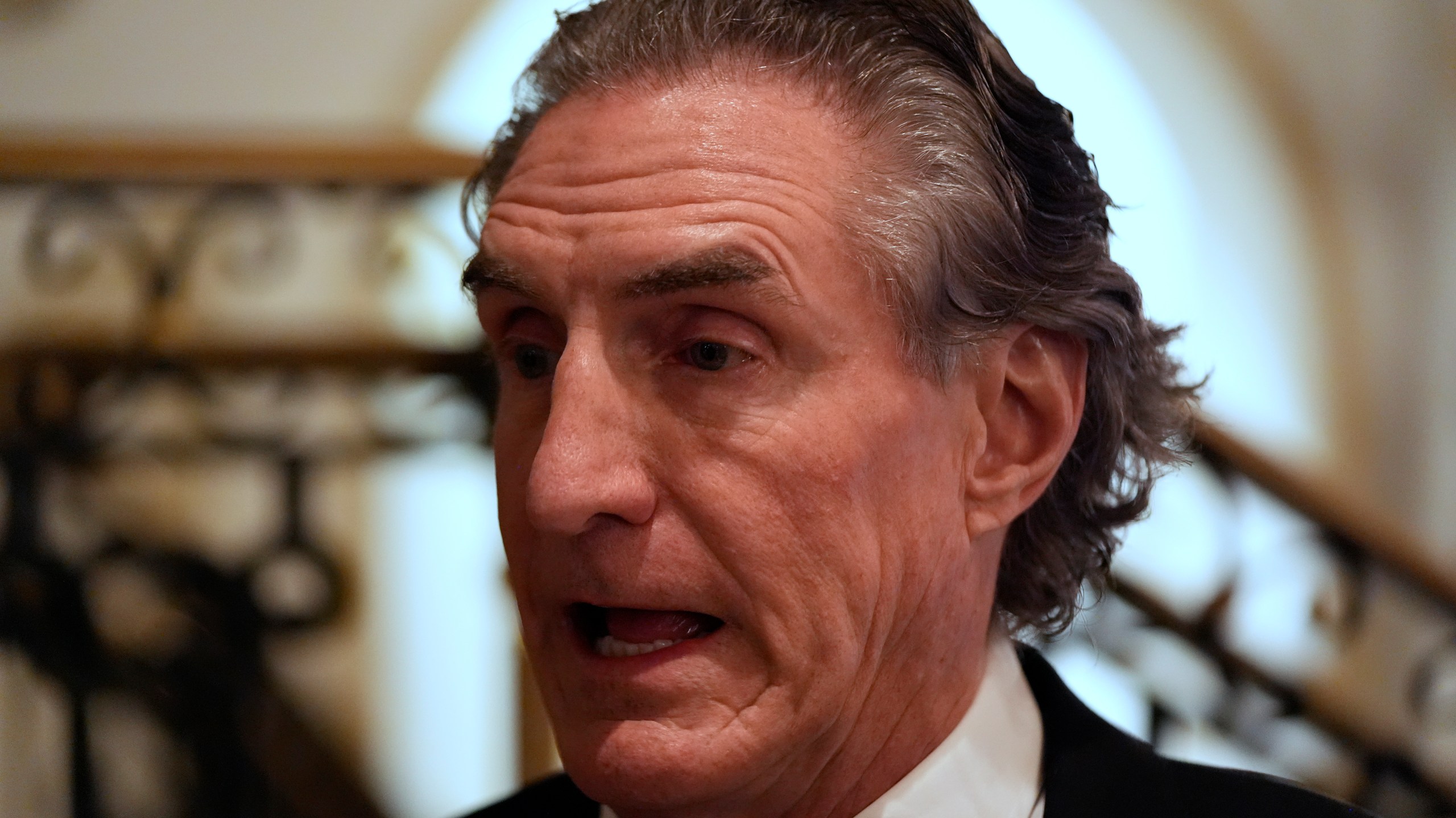 North Dakota Gov. Doug Burgum arrives before President-elect Donald Trump at an America First Policy Institute gala at his Mar-a-Lago estate, Thursday, Nov. 14, 2024, in Palm Beach, Fla. (AP Photo/Alex Brandon)