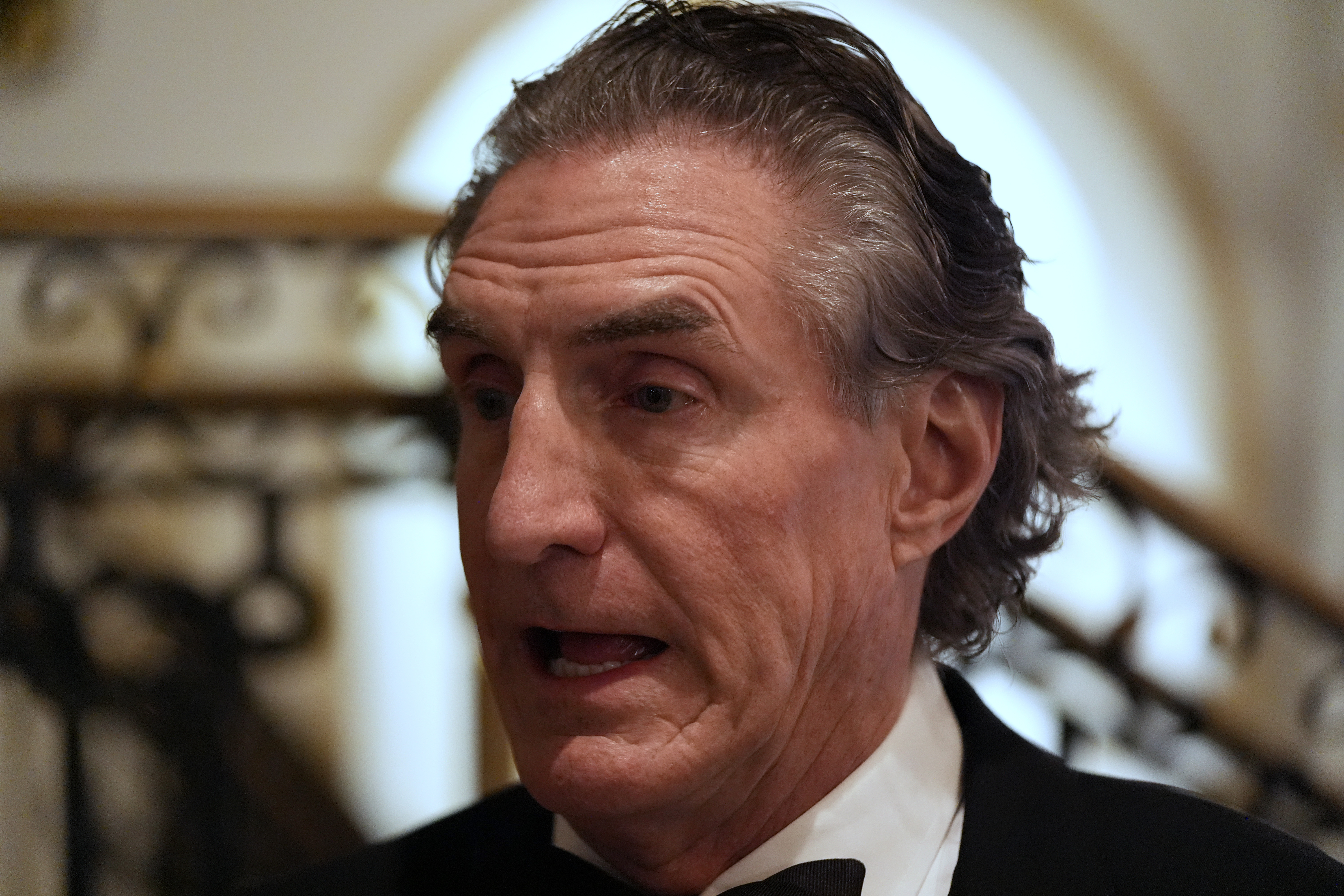 North Dakota Gov. Doug Burgum arrives before President-elect Donald Trump at an America First Policy Institute gala at his Mar-a-Lago estate, Thursday, Nov. 14, 2024, in Palm Beach, Fla. (AP Photo/Alex Brandon)