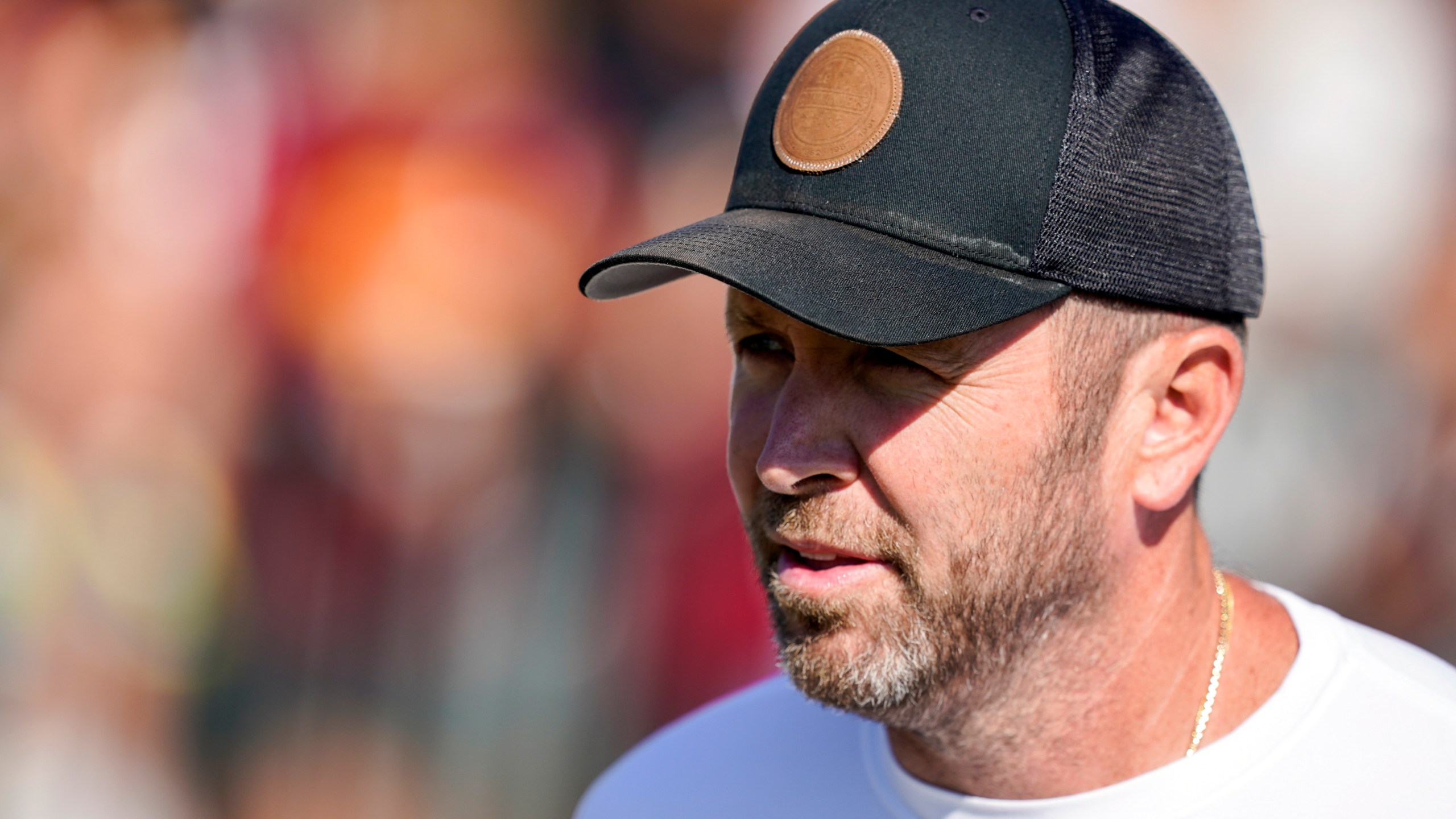 FILE - Washington Commanders offensive coordinator Scott Turner arrives for practice at the team's NFL football training facility, Aug. 18, 2022, in Ashburn, Va. (AP Photo/Alex Brandon, File)