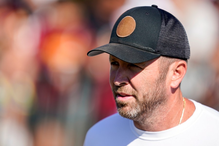 FILE - Washington Commanders offensive coordinator Scott Turner arrives for practice at the team's NFL football training facility, Aug. 18, 2022, in Ashburn, Va. (AP Photo/Alex Brandon, File)