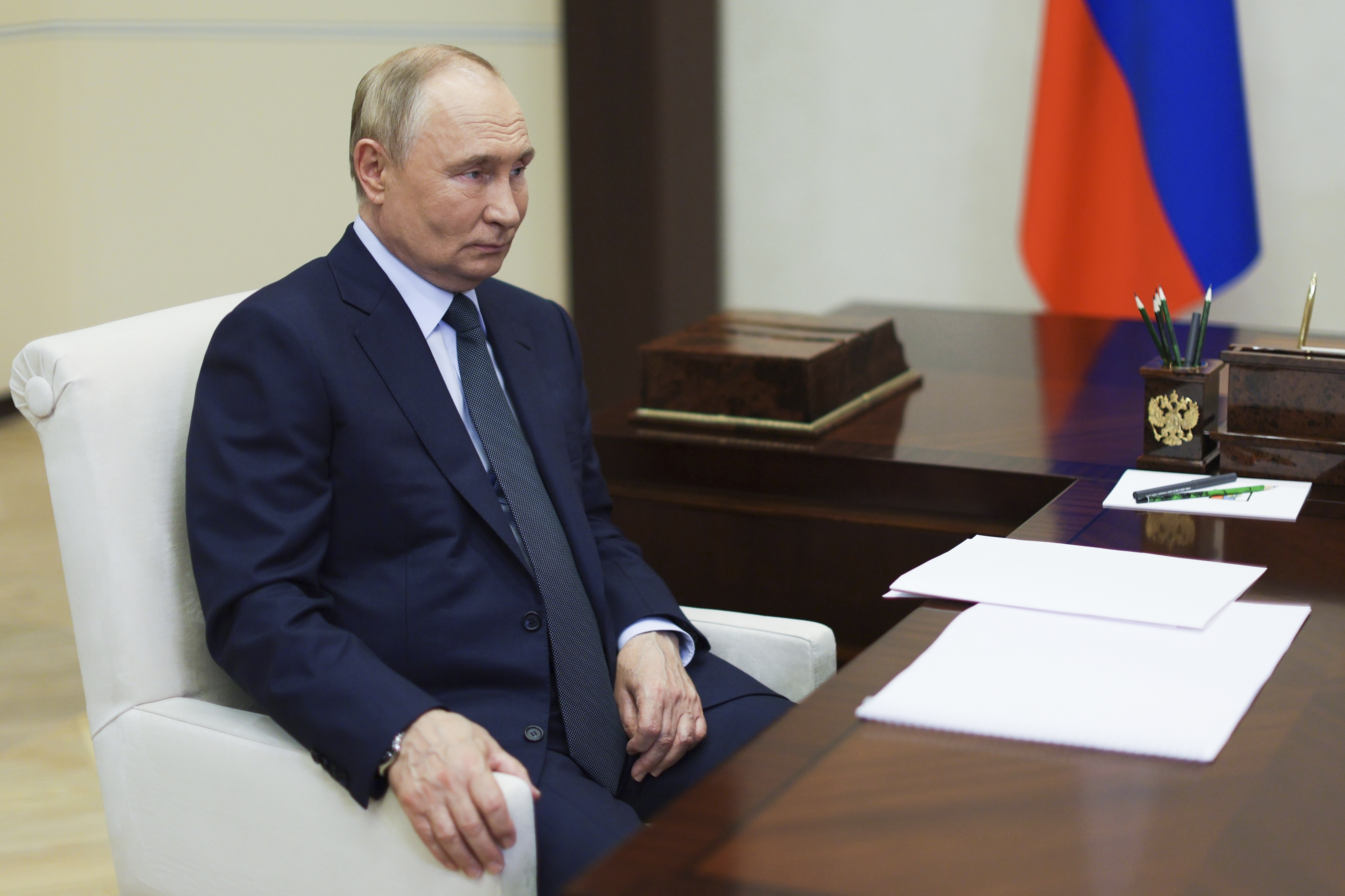 Russian President Vladimir Putin speaks with the head of Russian state space corporation Roscosmos Yuri Borisov during their meeting at Novo-Ogaryovo state residence outside of Moscow, Russia, Friday, Nov. 15, 2024. (Vyacheslav Prokofyev, Sputnik, Kremlin Pool Photo via AP)