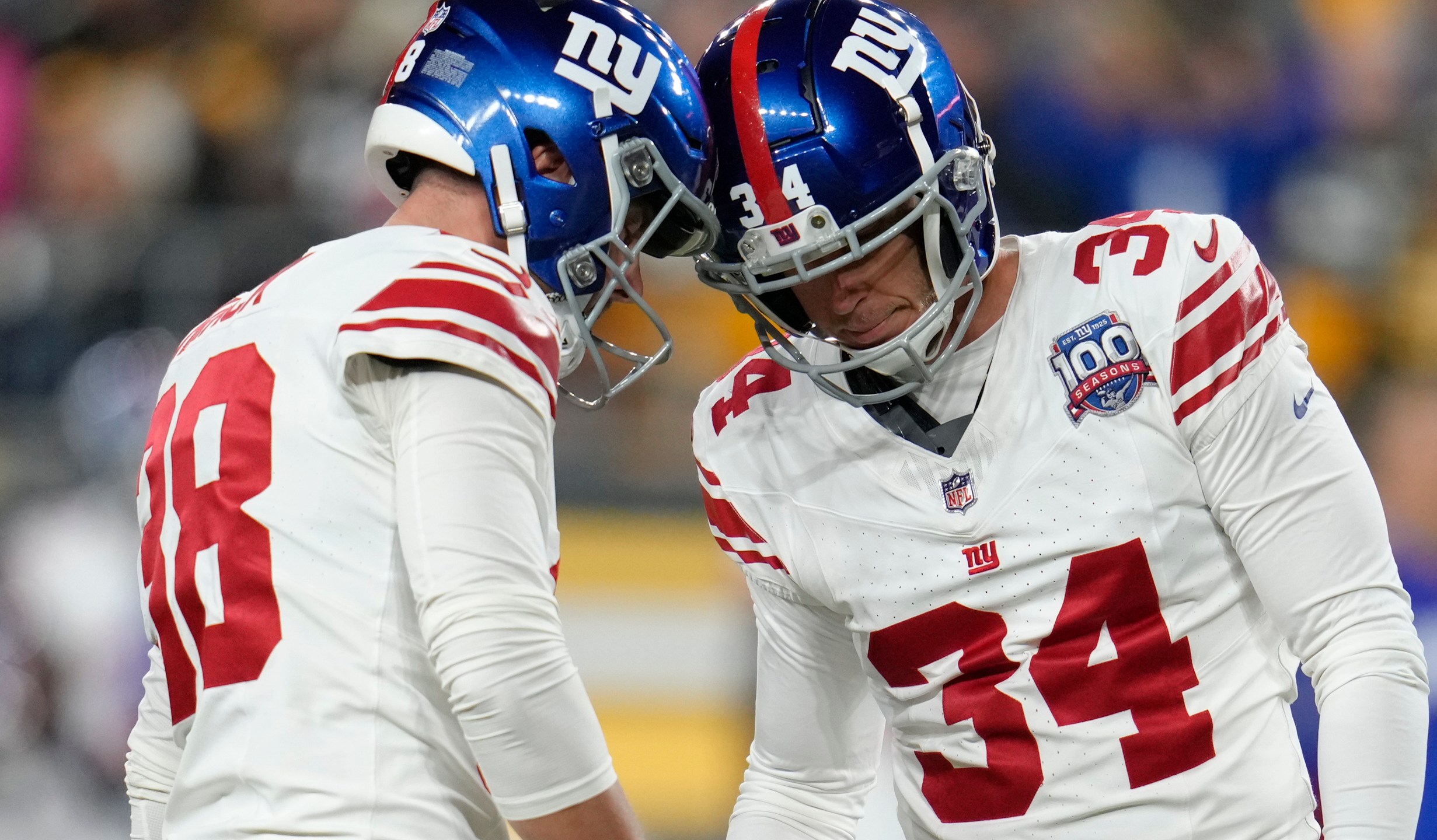 New York Giants place kicker Greg Joseph, right, celebrates with place holder Matt Haack after field goal during the first half of an NFL football game Monday, Oct. 28, 2024, in Pittsburgh. (AP Photo/Gene J. Puskar)