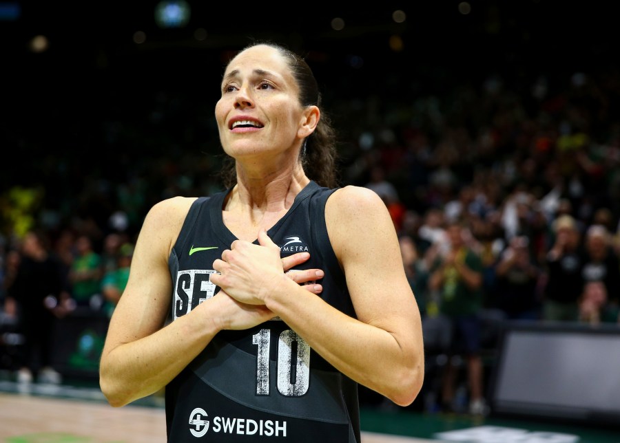 FILE - Seattle Storm guard Sue Bird reacts to fans chanting "Thank you Sue" after the Storm were eliminated from the playoffs with a loss in Game 4 of a WNBA basketball playoff semifinal to the Las Vegas Aces, Tuesday, Sept. 6, 2022, in Seattle. (AP Photo/Lindsey Wasson, File)