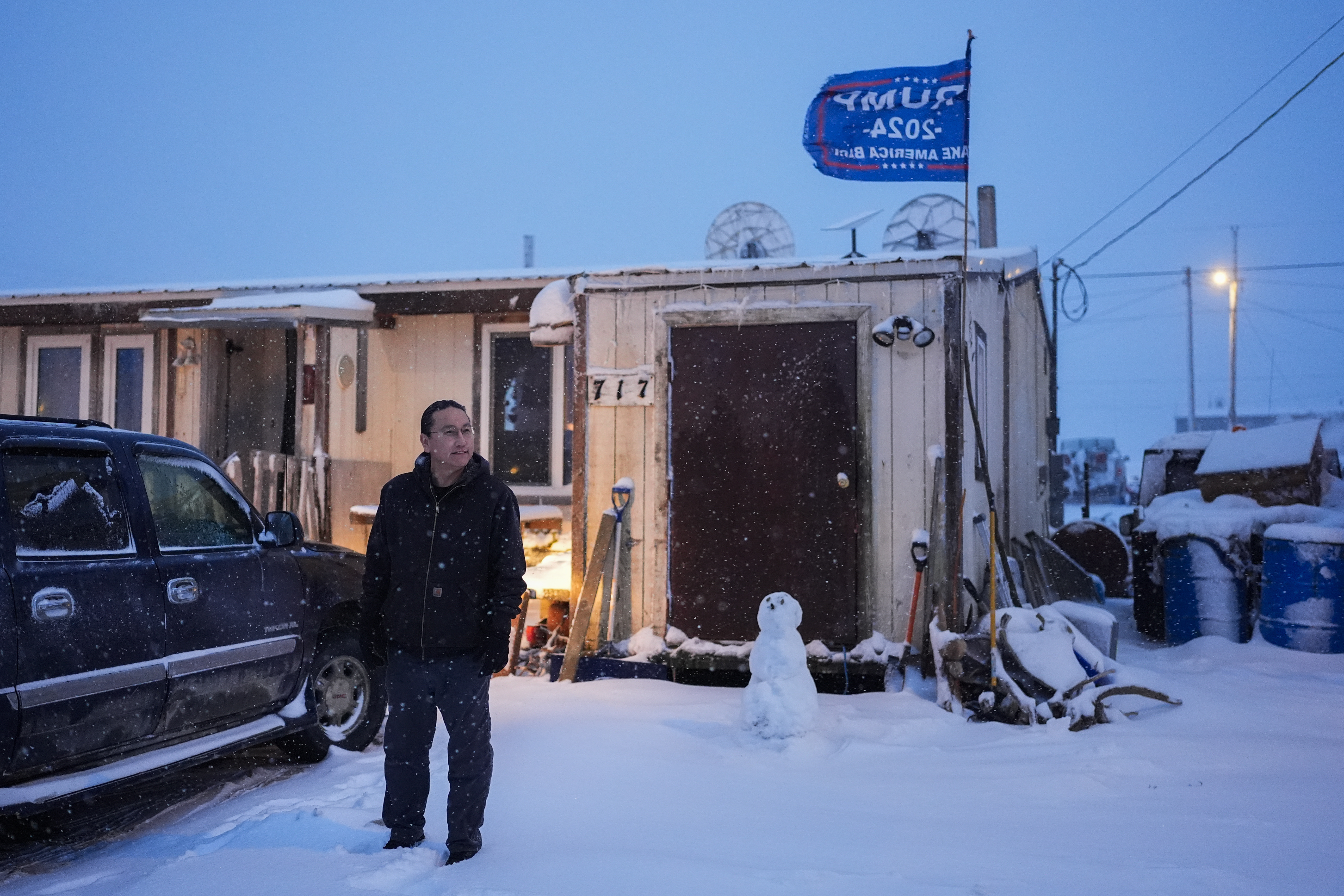 FILE- Charles Lampe, president of the Kaktovik Inupiat Corporation and a city council member, poses for a portrait outside his home, Wednesday, Oct. 16, 2024, in Kaktovik, Alaska. (AP Photo/Lindsey Wasson, File)