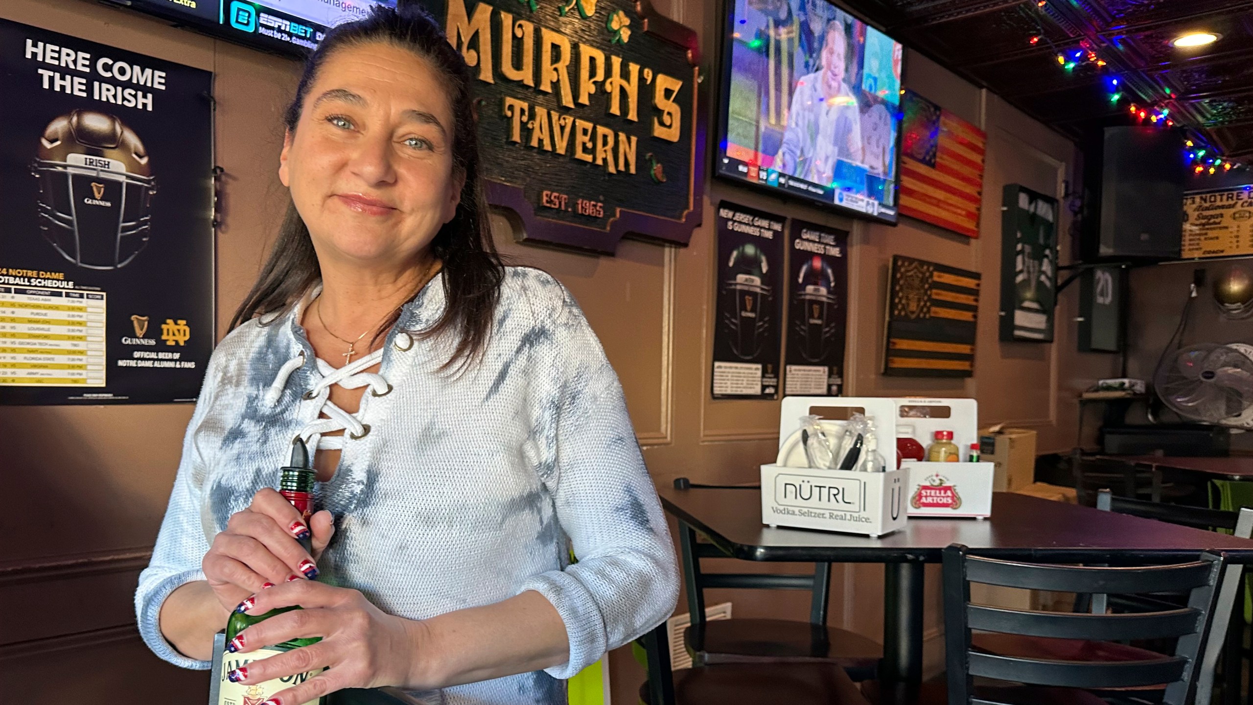 Mara Russo, a bartender at Murph's Tavern in Totowa, N.J., speaks about why she supported President-elect Donald Trump in 2024. Totowa, in suburban New York's Passaic County, went for a Republican for president for the first time since 1992. (AP photo/Mike Catalini)