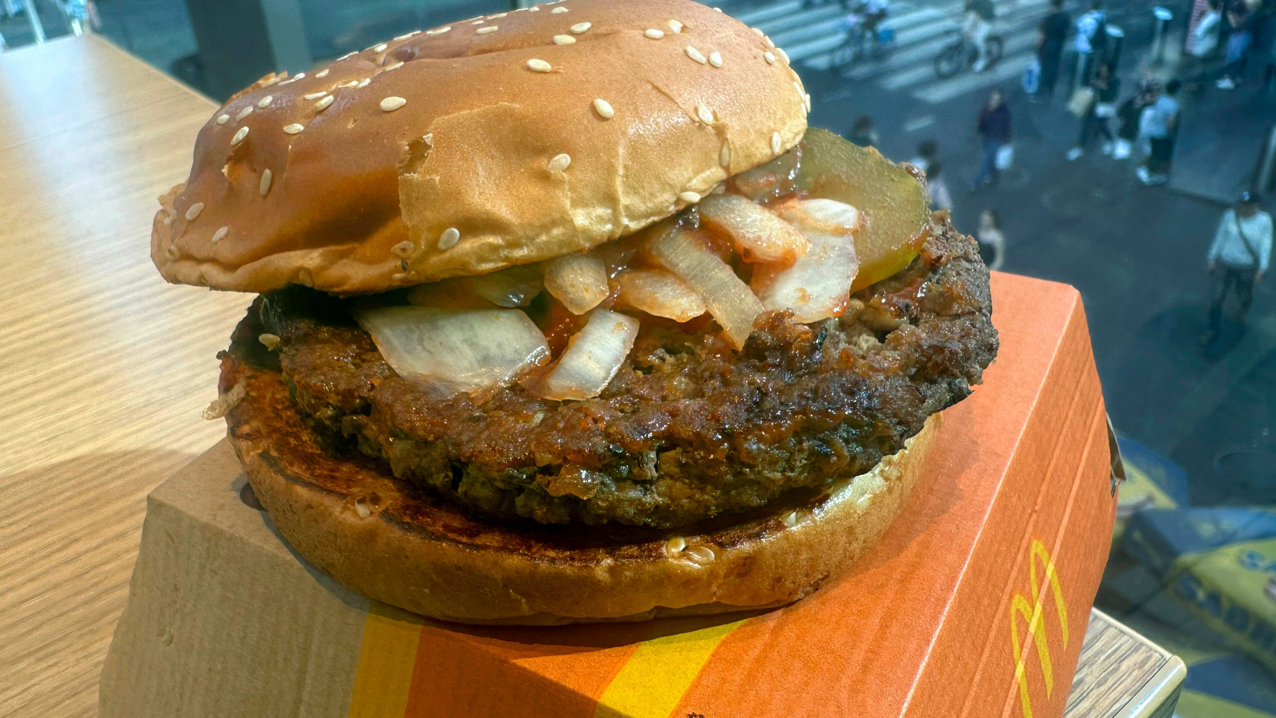 A McDonald's Quarter Pounder hamburger is shown in this photograph, in New York's Times Square, Wednesday, Oct. 23, 2024. (AP Photo/Richard Drew)