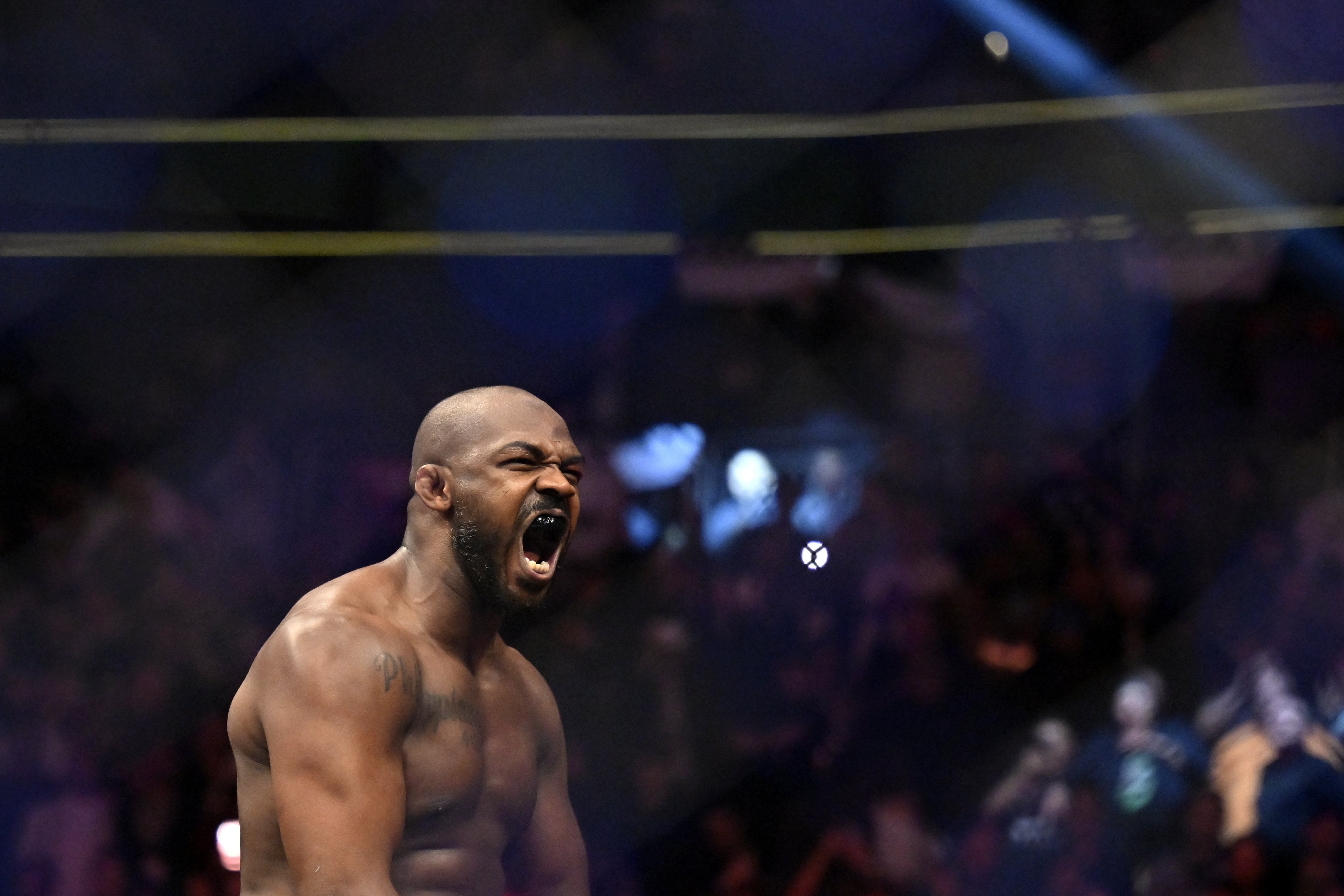 FILE - Jon Jones reacts after his victory over Ciryl Gane in a UFC 285 mixed martial arts heavyweight title bout Saturday, March 4, 2023, in Las Vegas. (AP Photo/David Becker, File)