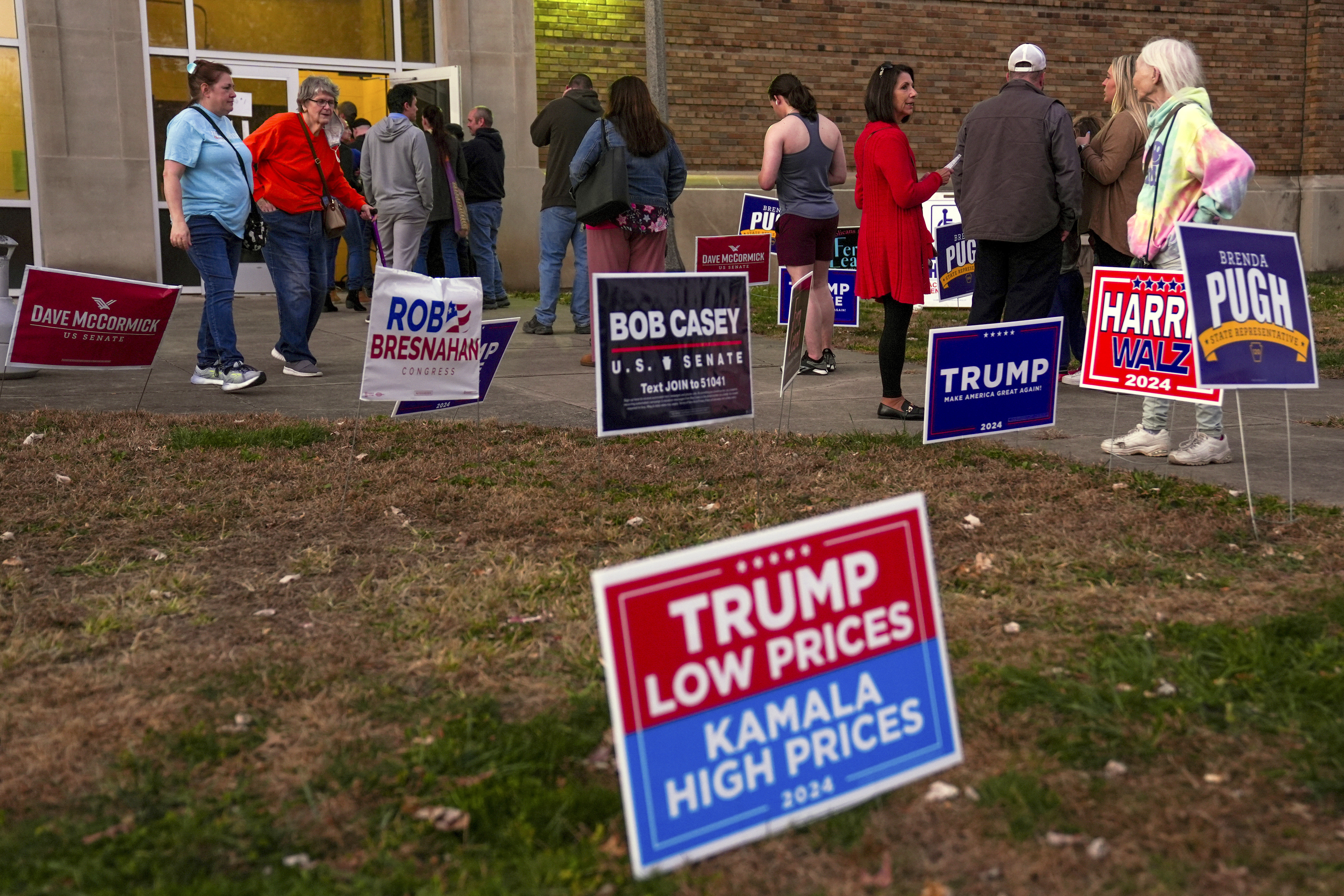 FILE - Voters wait in line to cast their ballots at the Kingston Armory in Wilkes-Barre, Pa, Nov. 5, 2024. (AP Photo/Matt Rourke, File)