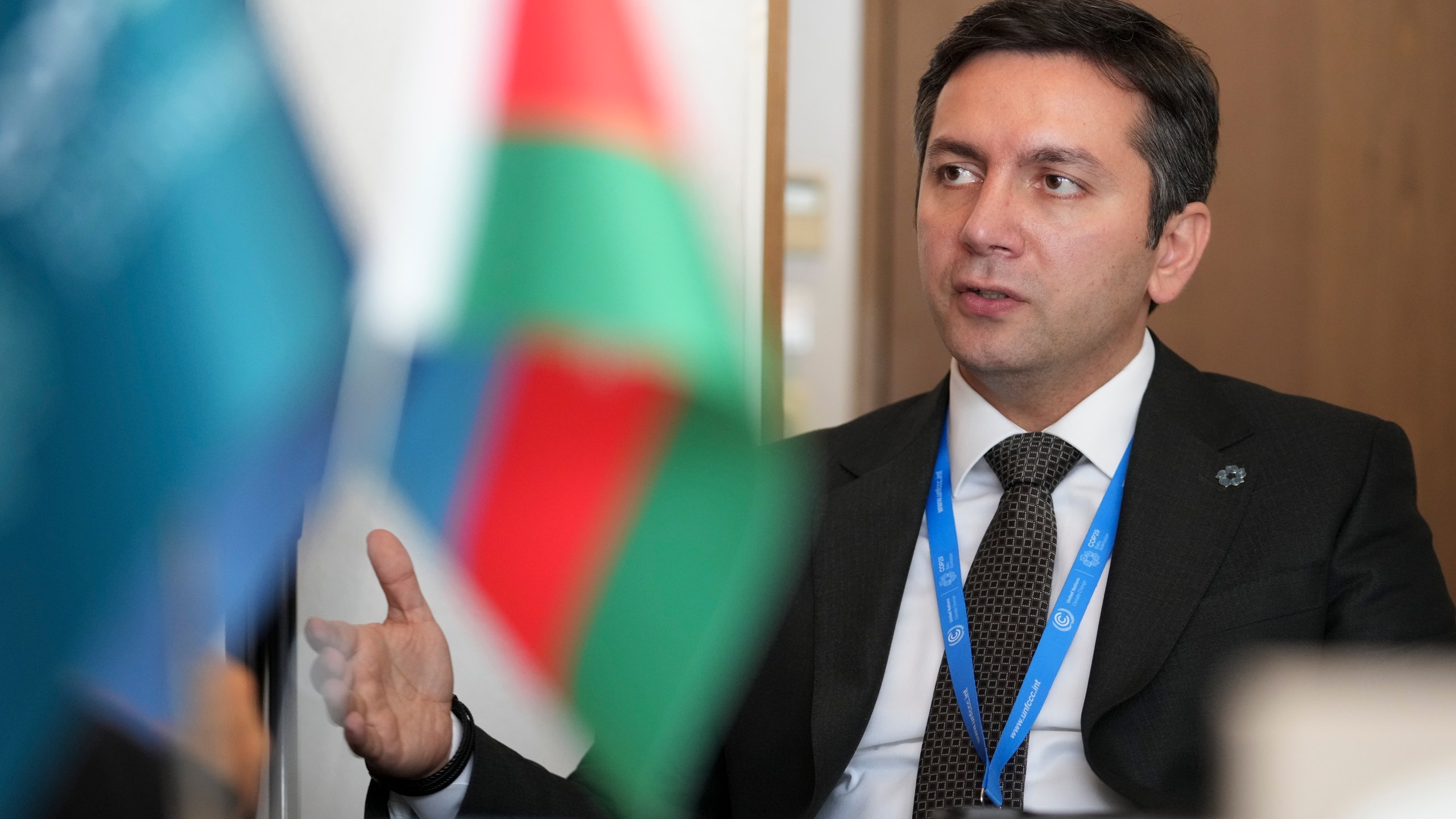 Yalchin Rafiyev, Azerbaijan's COP29 lead negotiator, speaks during an interview with The Associated Press at the COP29 U.N. Climate Summit, Tuesday, Nov. 19, 2024, in Baku, Azerbaijan. (AP Photo/Sergei Grits)