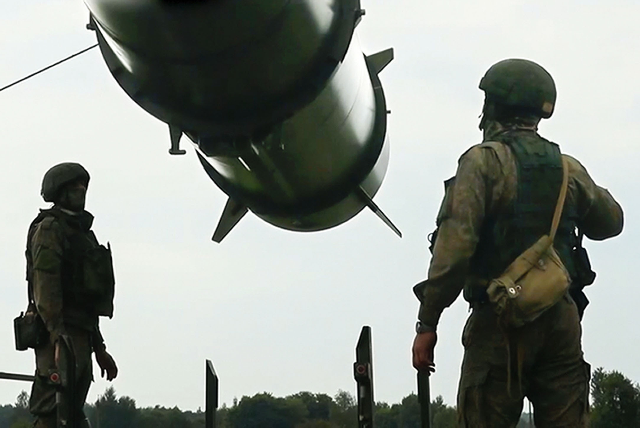 FILE - In this photo taken from video released by the Russian Defense Ministry Press Service on Wednesday, June 12, 2024, Russian soldiers load a Iskander-M short-range ballistic missile launchers at a firing position as part of Russian military drill intended to train the troops in using tactical nuclear weapons. (Russian Defense Ministry Press Service via AP, File)