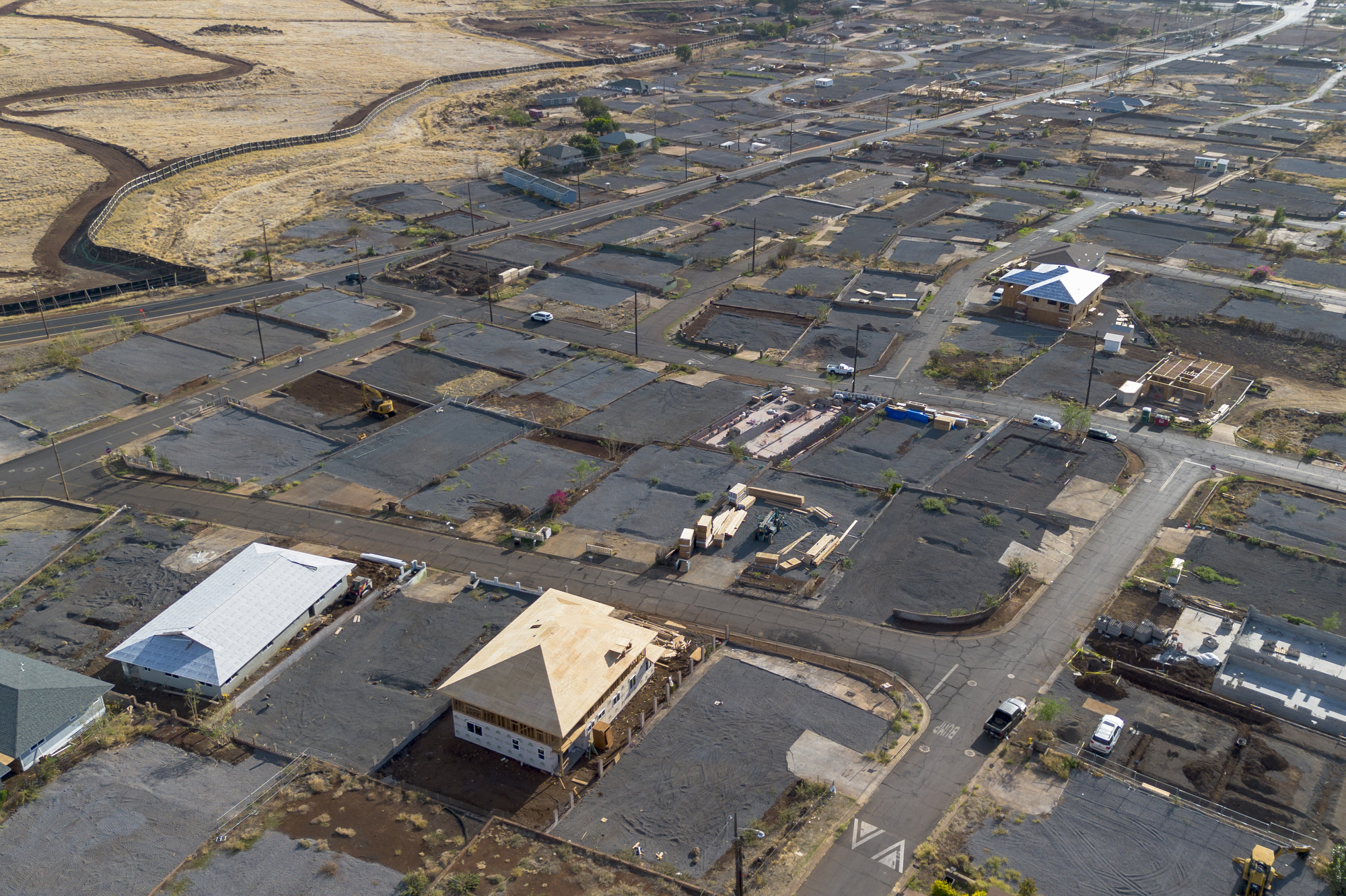 Houses are being rebuilt in the burn zone, Monday, Nov. 18, 2024, in Lahaina, Hawaii. Over a hundred building permits have been issued after Maui County received 291 applications. (AP Photo/Mengshin Lin)