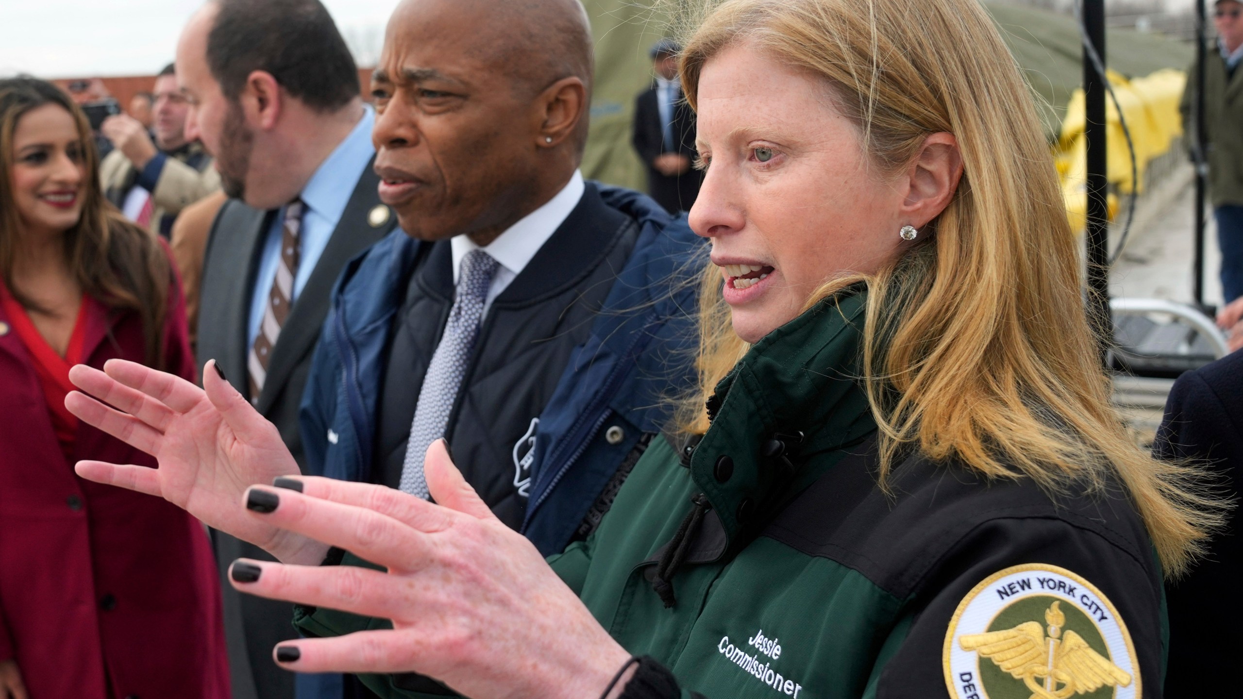 This image provided by the Office of the New York Mayor shows New York Mayor Eric Adams, second from right, and New York City Department of Sanitation Commissioner Jessica Tisch, right, during a major expansion of capacity at the Staten Island Compost Facility, Jan. 4, 2024. (Michael Appleton/Mayoral Photography Office via AP)