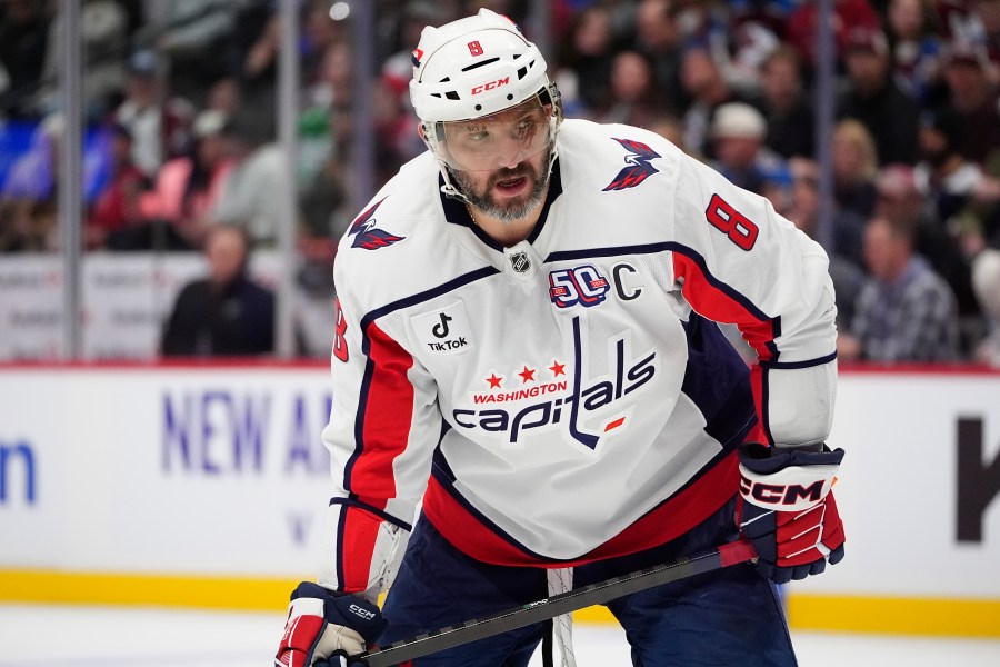 Washington Capitals left wing Alex Ovechkin waits for a face off in the second period of an NHL hockey game against the Colorado Avalanche, Friday, Nov. 15, 2024, in Denver. (AP Photo/David Zalubowski)