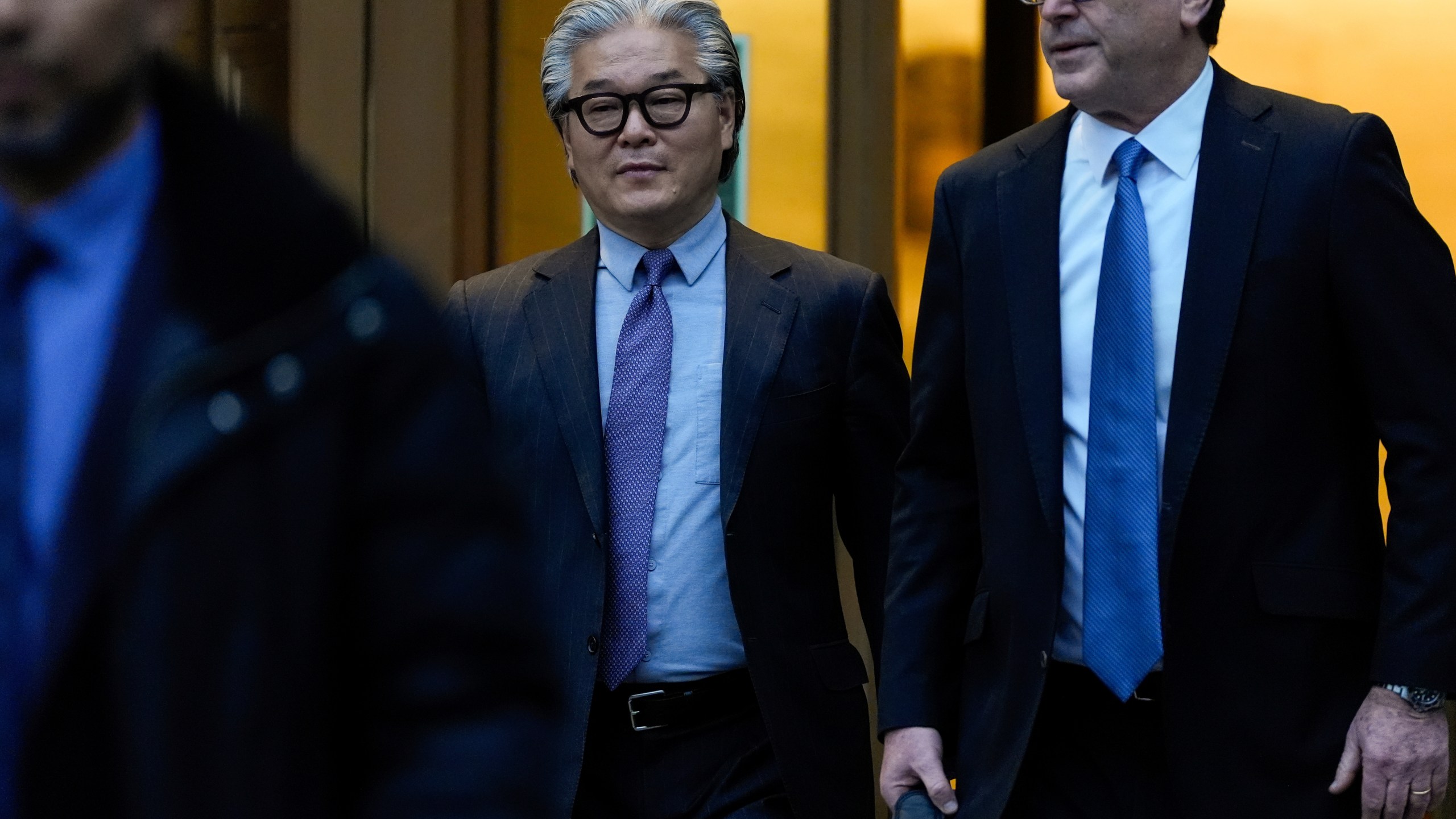 Bill Hwang, center, founder of Archegos Capital Management, departs federal court, Wednesday, Nov. 20, 2024, in New York. (AP Photo/Julia Demaree Nikhinson)