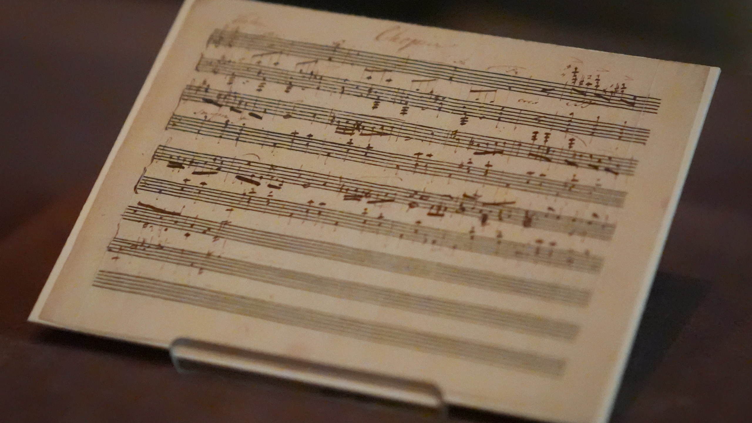 A previously unknown musical manuscript, possibly by Frederic Chopin, rests in a display case after it was discovered at The Morgan Library & Museum, Wednesday, Nov. 13, 2024, in New York. It's discovery marks the first such find since 1930, though its authenticity remains debated. (AP Photo/John Minchillo)